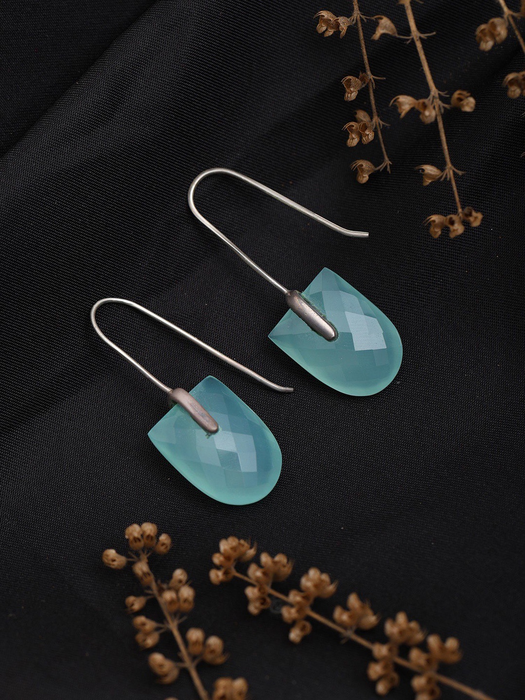 

Exotic India Faceted Aqua Chalcedony Drop Earrings, Blue