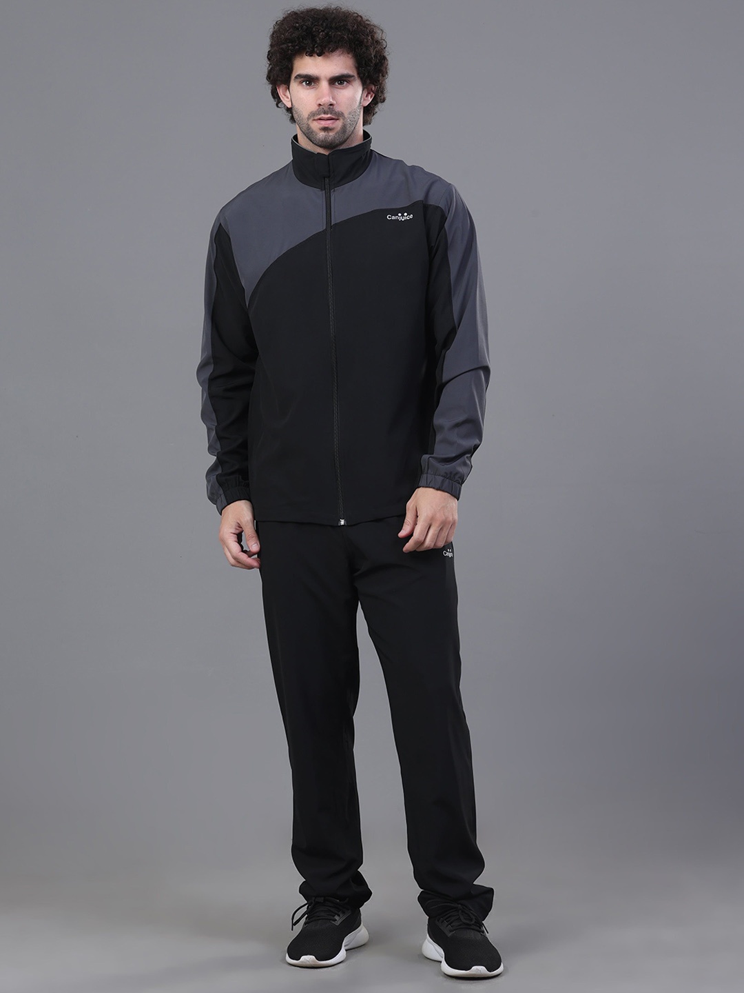 

Canjuice Men Woven Colourblocked Tracksuits, Black