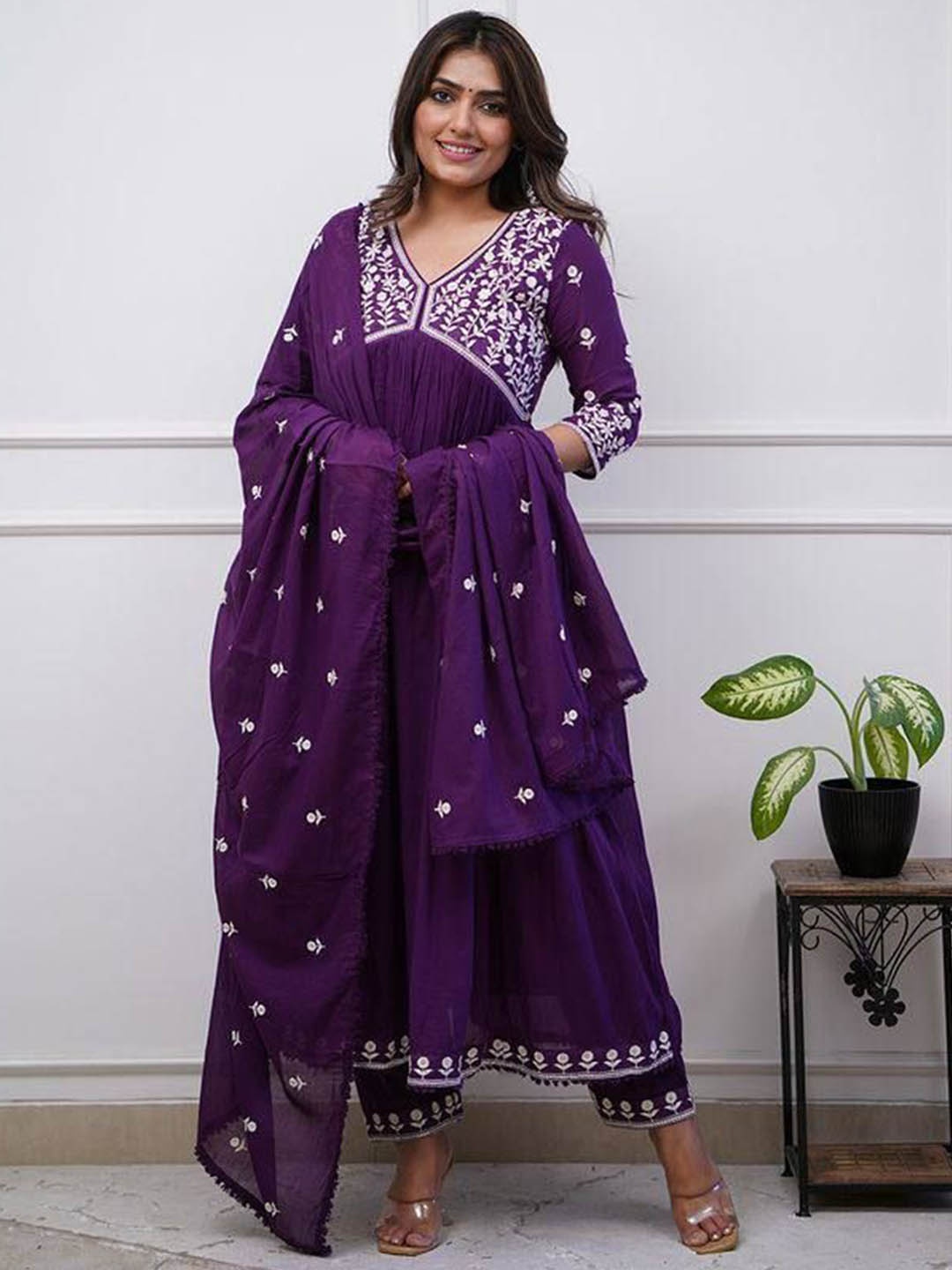 

Siya Fashion Floral Embroidered Sequinned V Neck Empire Kurta with Trousers And Dupatta, Purple