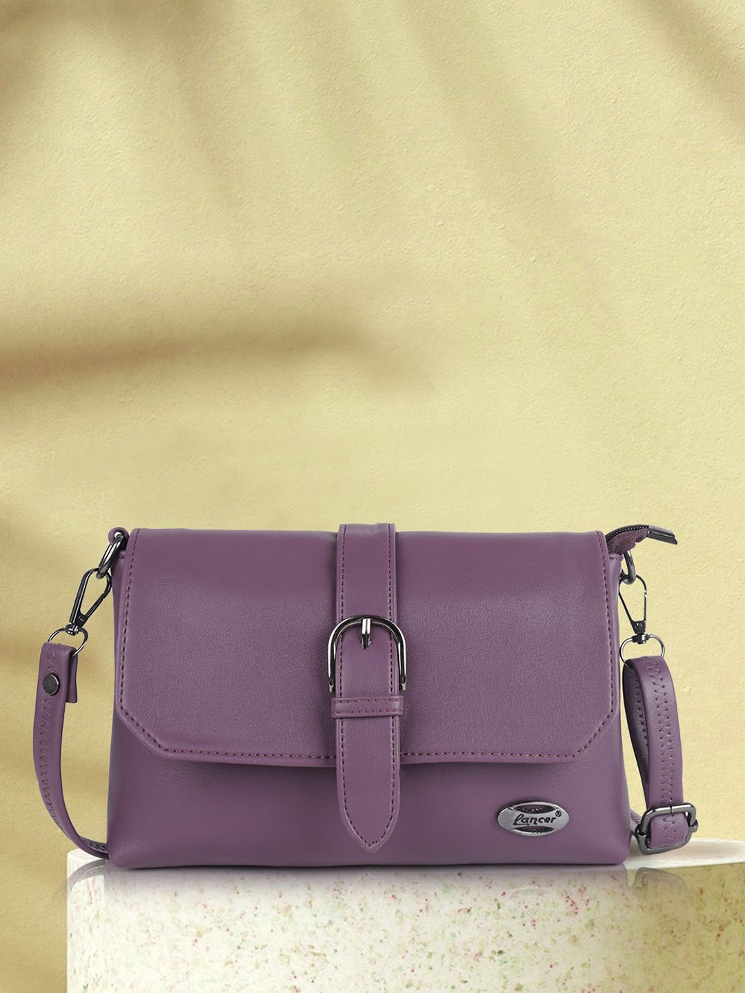

Lancer Women Solid Structured Leather Sling Bag, Purple