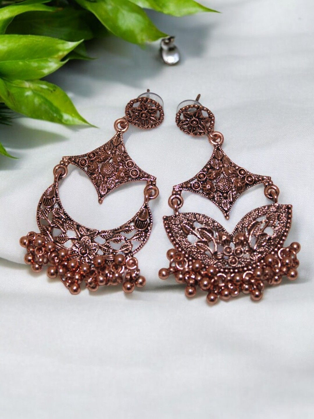 

Jolly Faces Copper Plated Artificial Beadded Crescent Shaped Drop Earrings