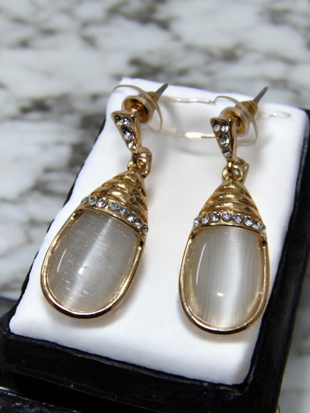 

Jolly Faces Gold-Plated Artificial Stones Studded Contemporary Drop Earrings