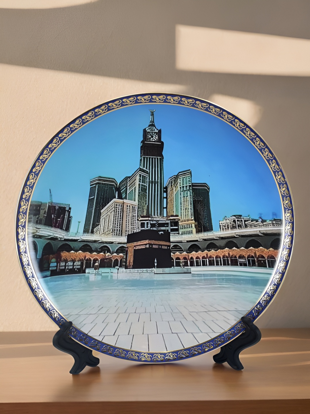 

The Decor Lane Blue & Black Printed Ceramic Wall Plate With Stand