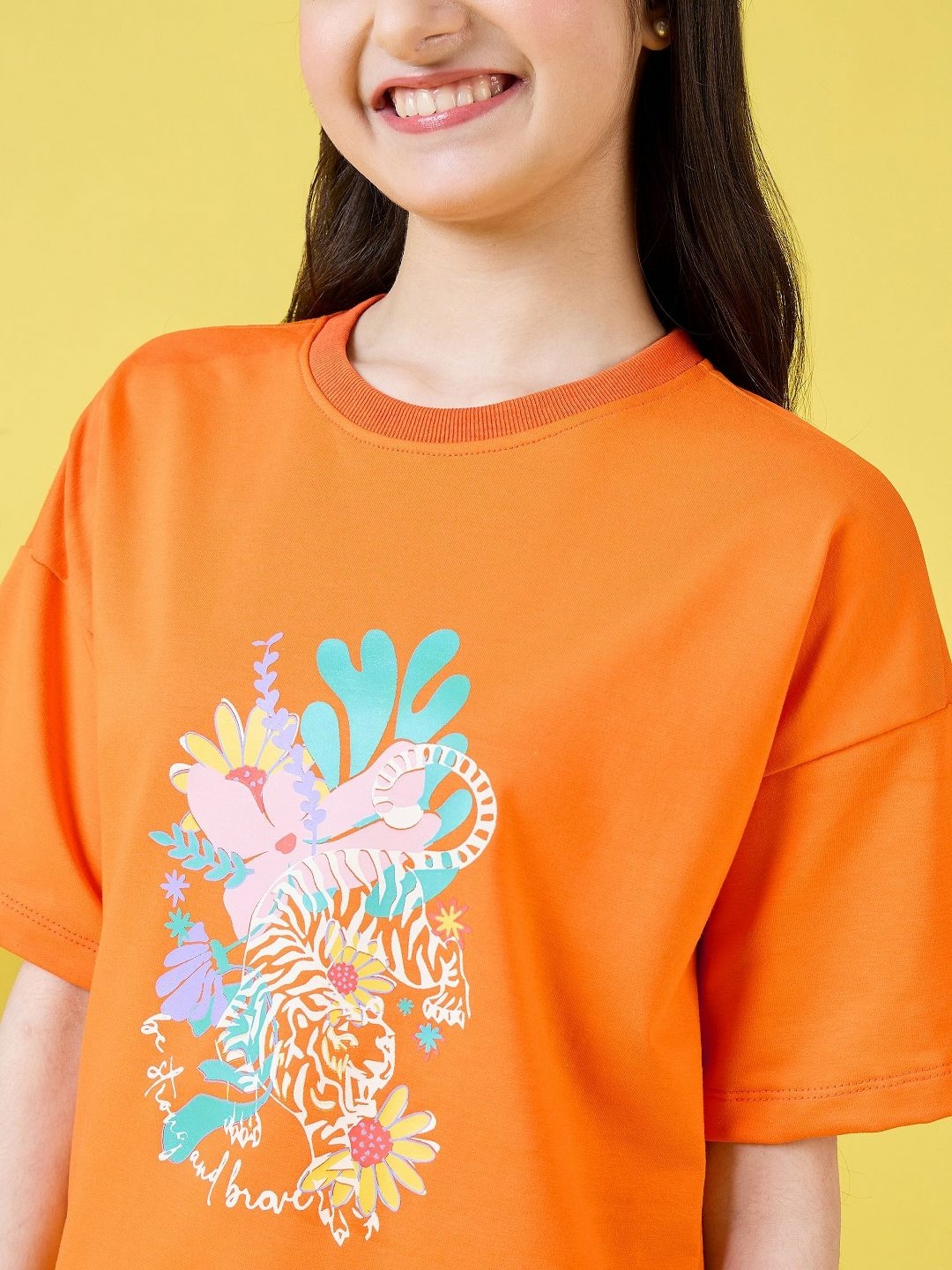 

Stylo Bug Girls Floral Printed Cotton Oversized T-shirt, Orange