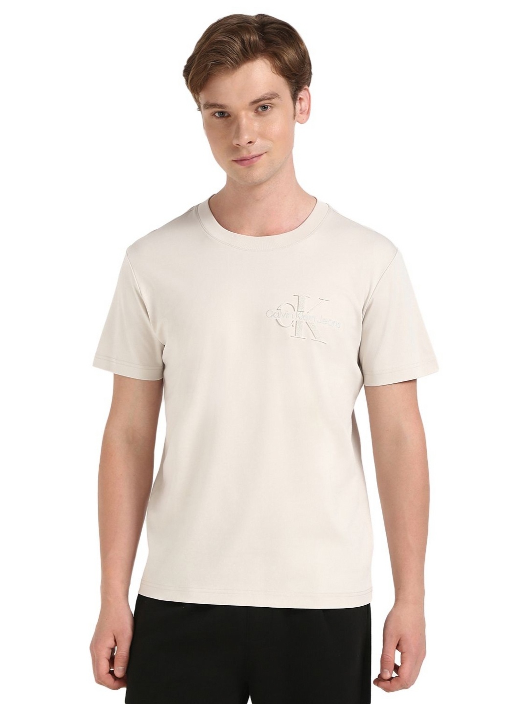 

Calvin Klein Jeans Men Solid Round Neck Cotton T-shirt, Beige