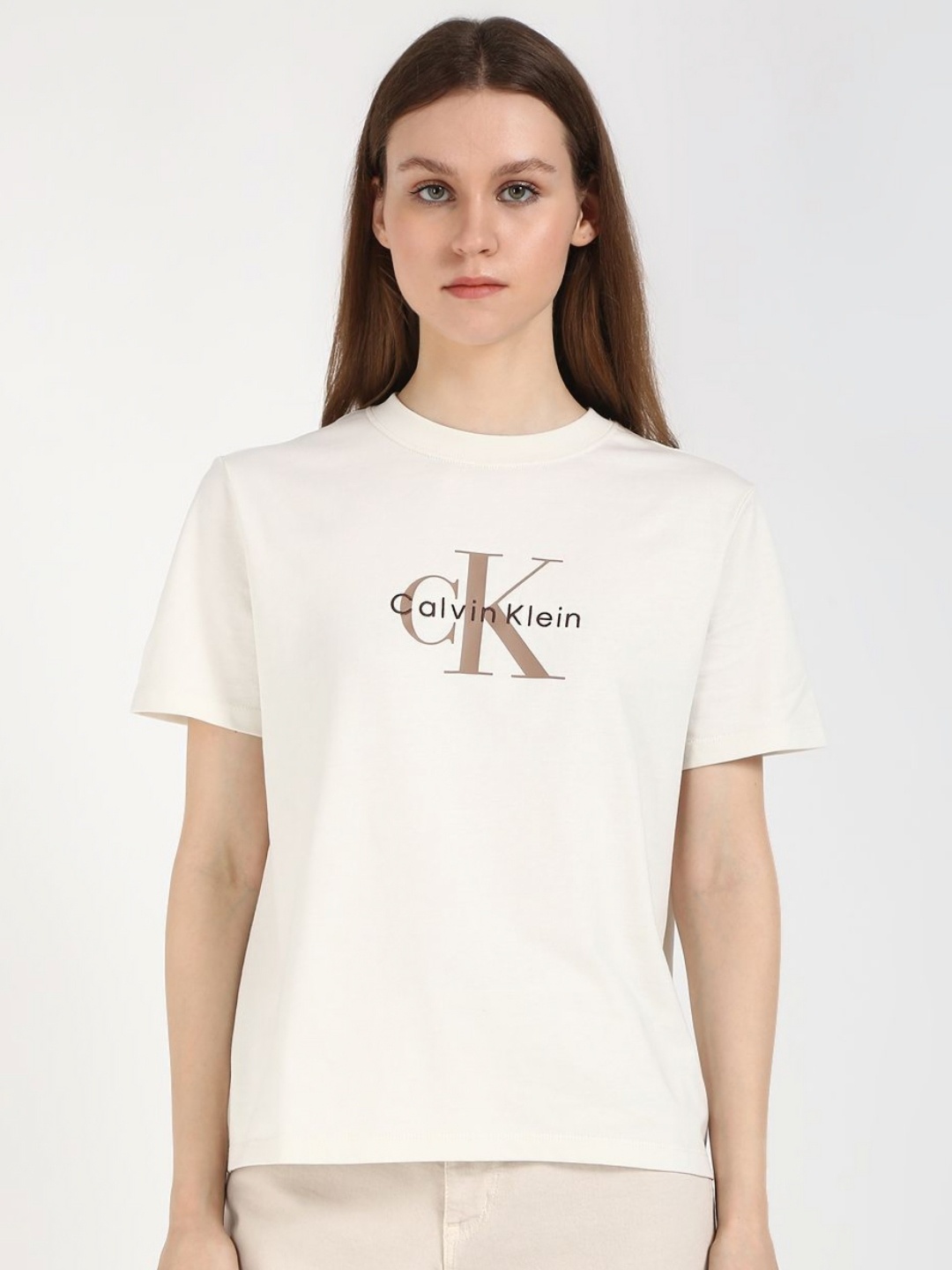 

Calvin Klein Jeans Women Typography Printed Round Neck Cotton T-shirt, Beige