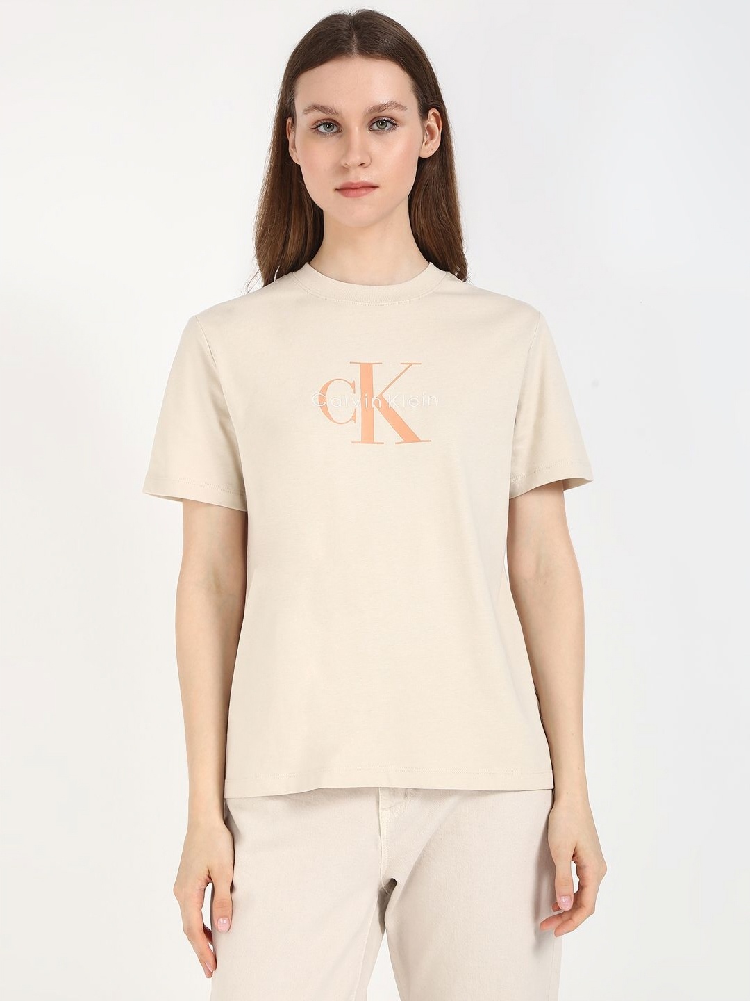 

Calvin Klein Jeans Women Typography Printed Round Neck Cotton T-shirt, Beige