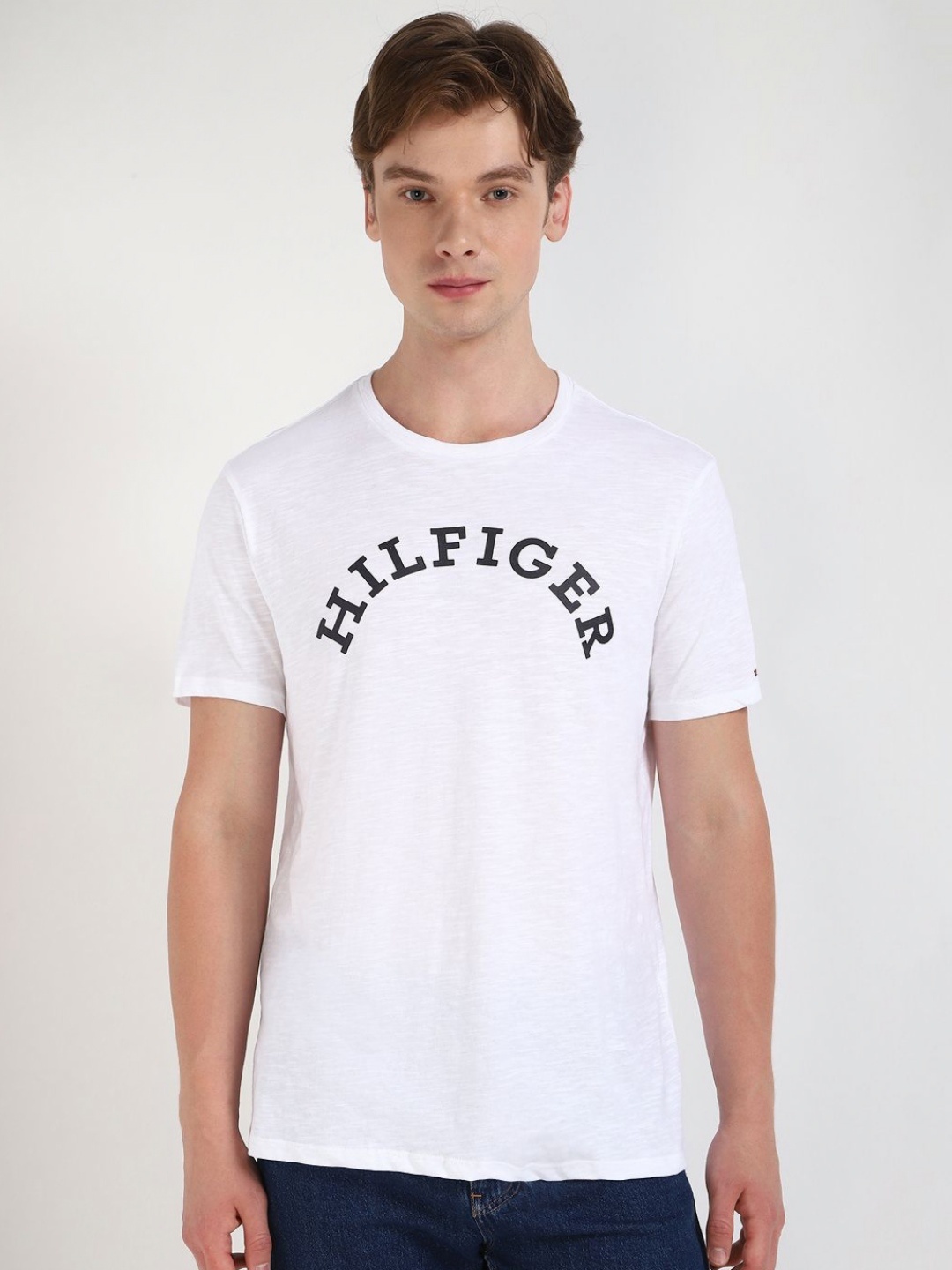 

Tommy Hilfiger Men Typography Printed Round Neck Cotton T-shirt, White