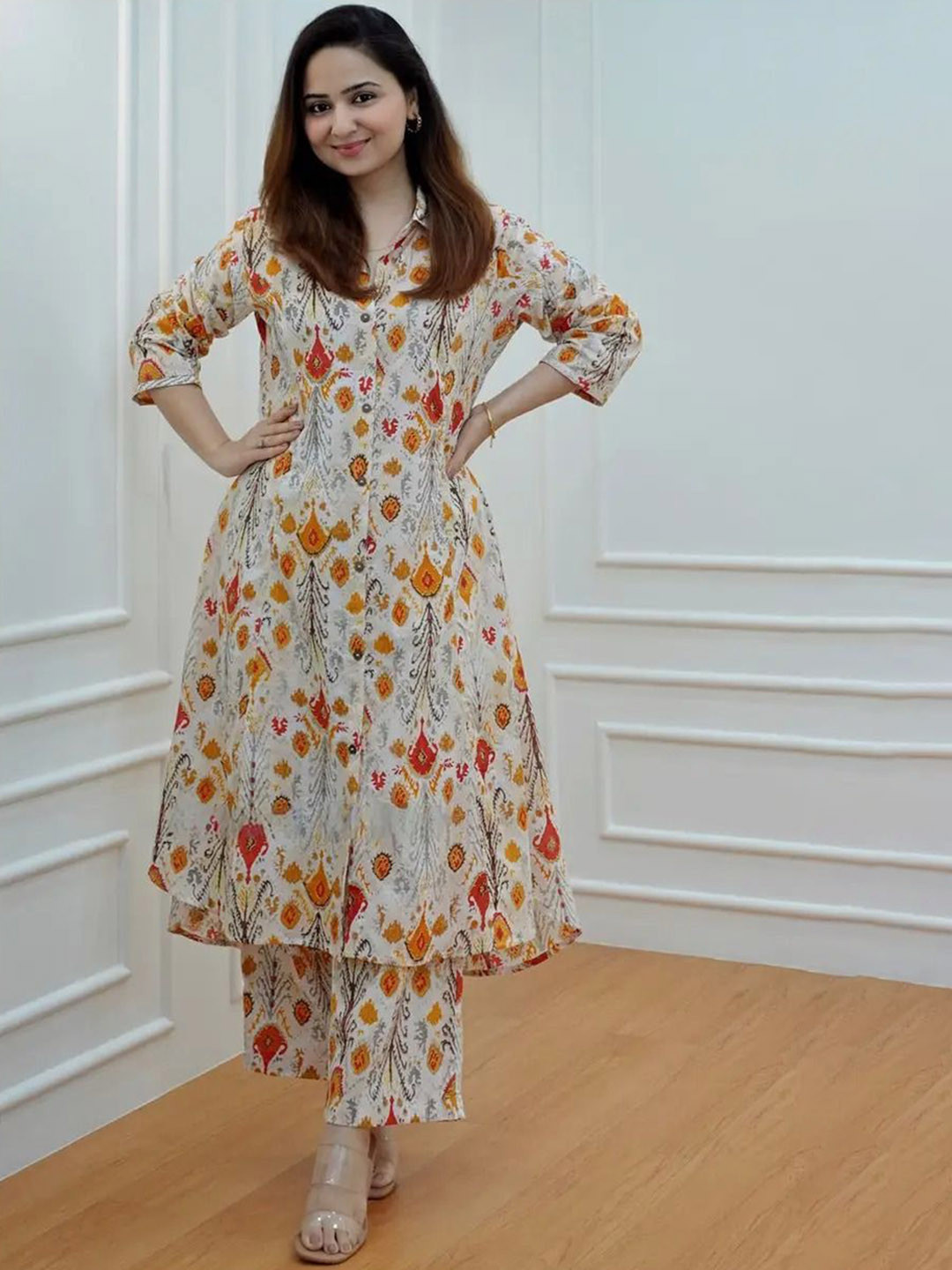 

AARYAHI Ethnic Motifs Printed Shirt Collar A-Line Pure Cotton Kurta With Trousers, Beige