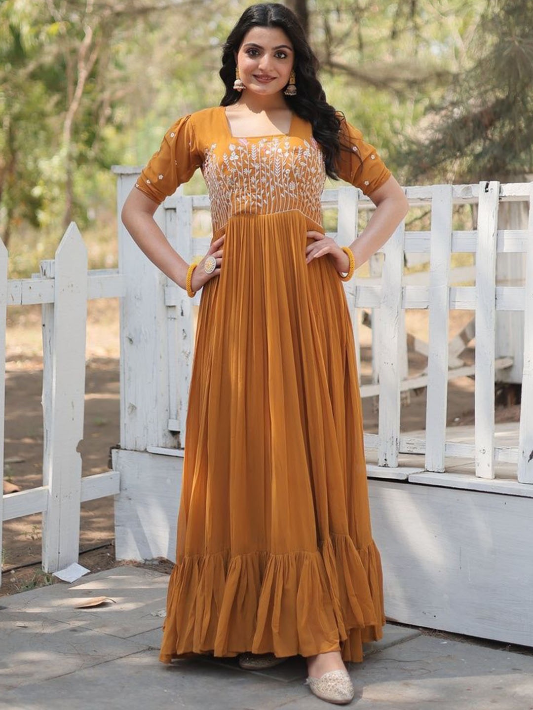 

Fusionic Women Square Neck Embroidered Maxi Gown, Mustard