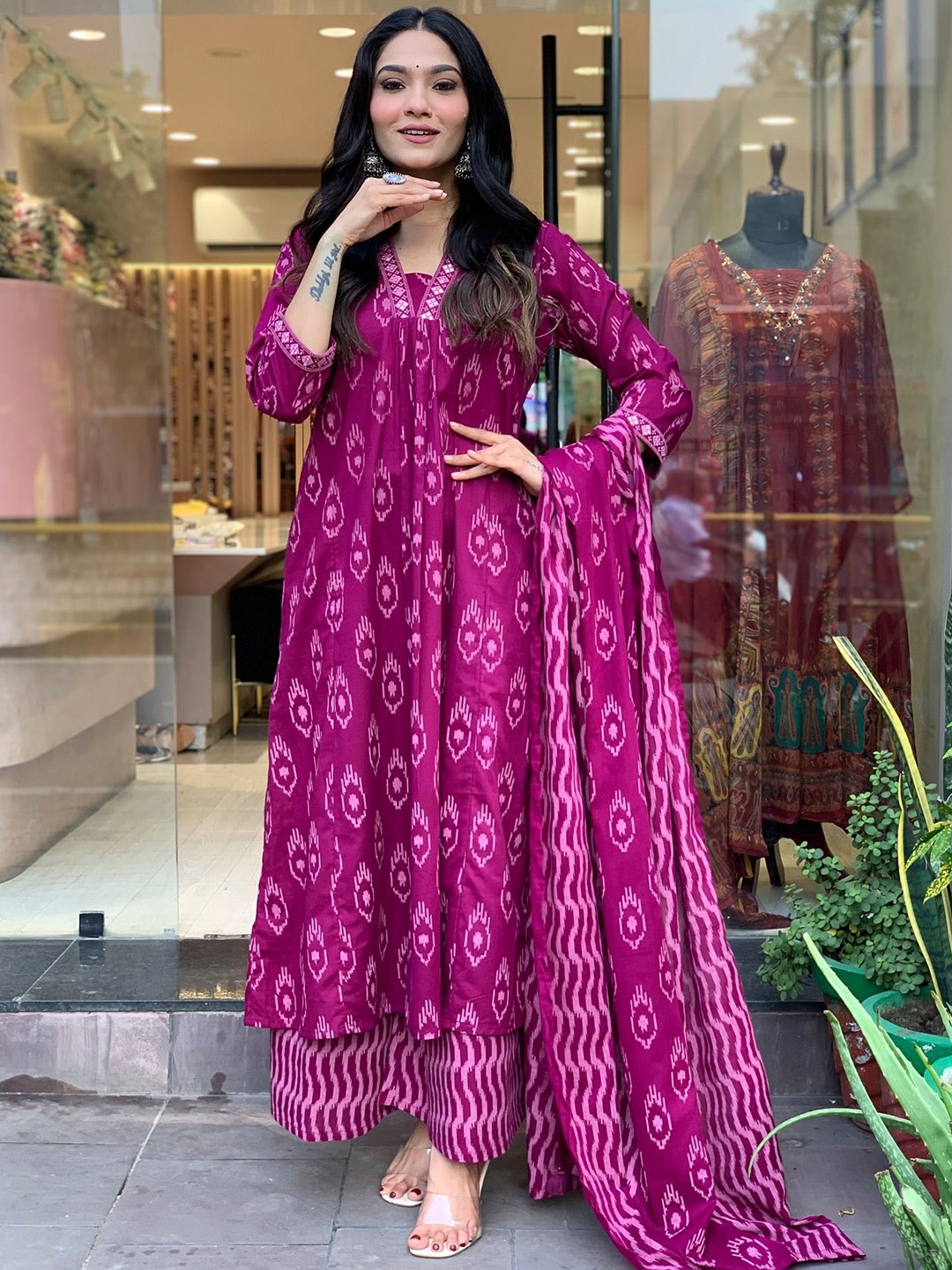 

GoSriKi Ethnic Motifs Printed Pleated V-Neck A-Line Kurta With Palazzos And Dupatta, Magenta
