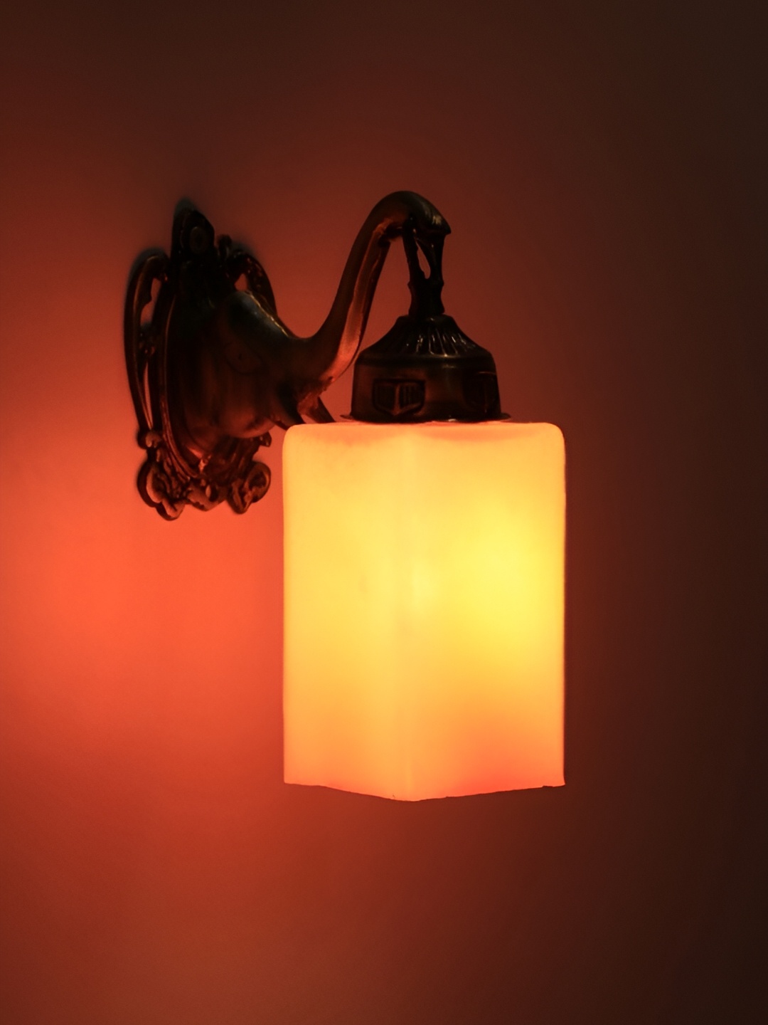 

VAGalleryKing Orang & Metallic Toned Antique Elephant Design Glass Wall Lamp, Orange