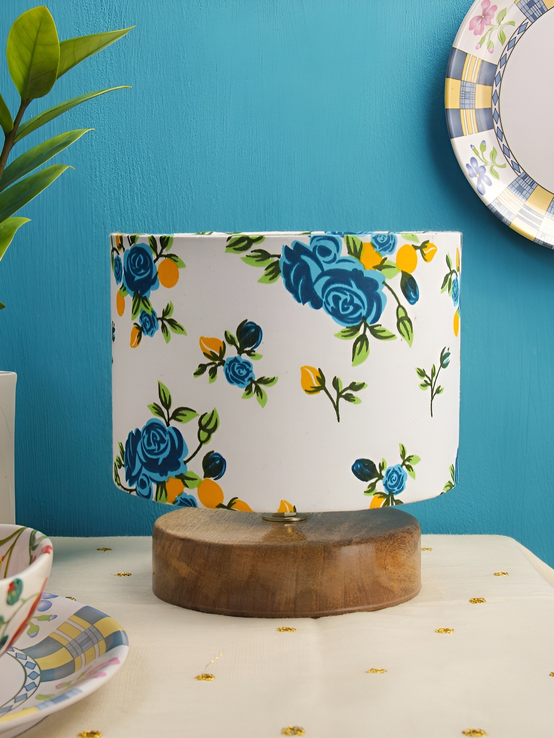 

Aura White and Brown Floral Printed Wooden Cylindrical Shaped Table Lamp