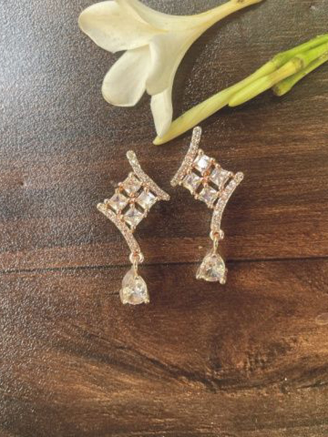

MONI LIFESTYLE Rose Gold Plated Artificial Stones Studded Contemporary Drop Earring