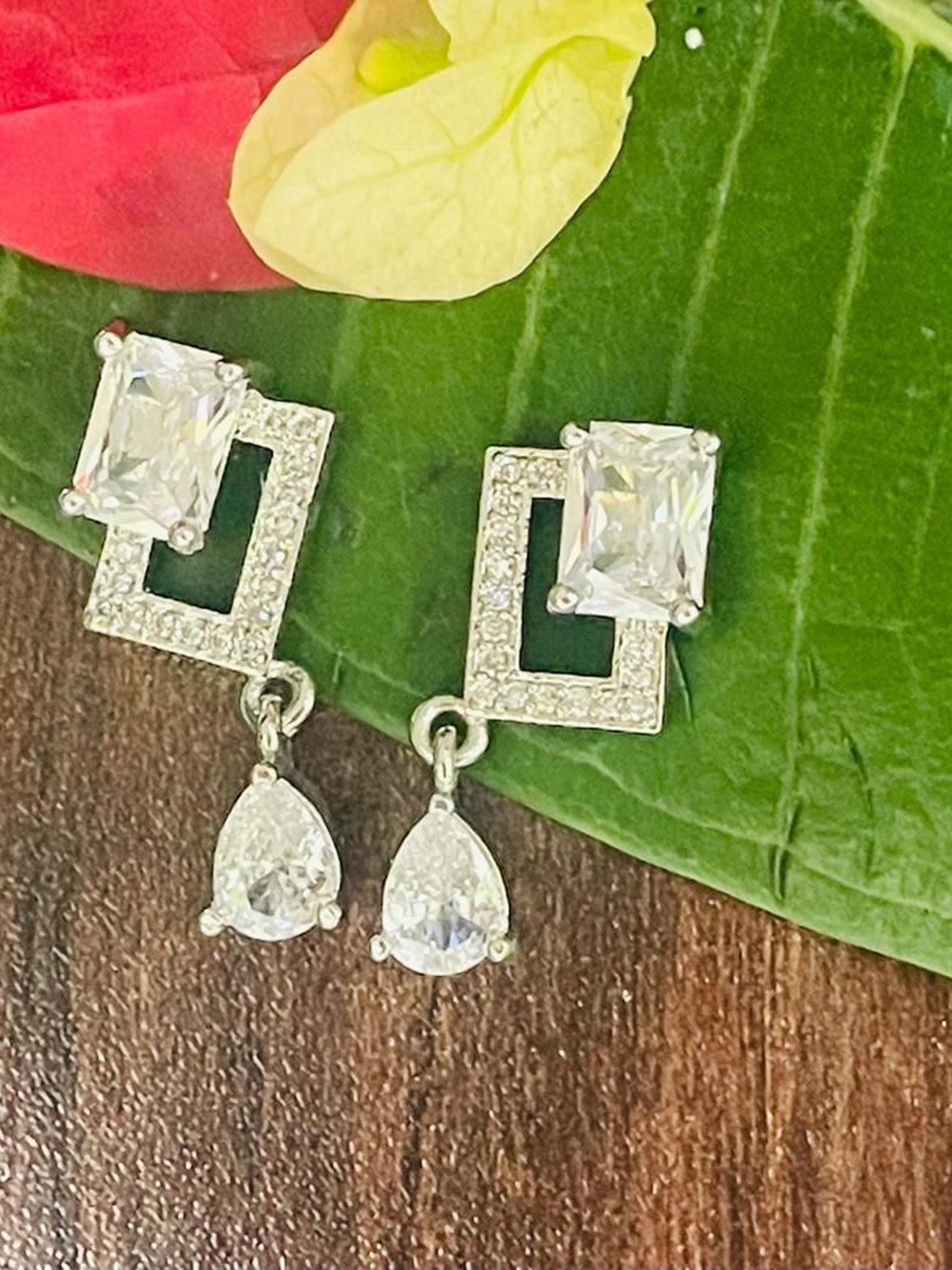 

MONI LIFESTYLE Silver Plated Artificial Stones Studded Square Shaped Drop Earrings