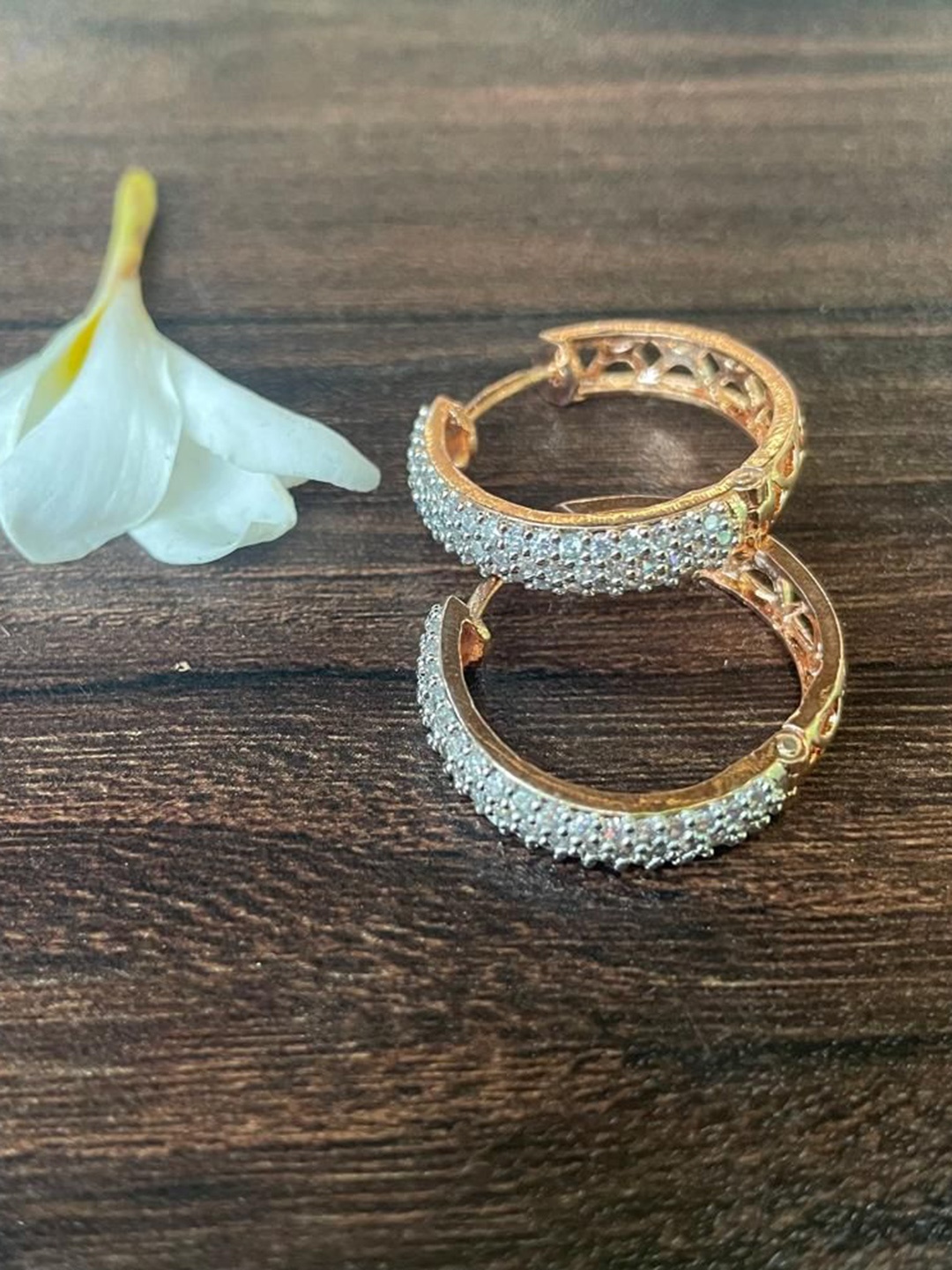 

MONI LIFESTYLE Rose Gold Plated Zircon Studded Circular Shaped Hoop Earrings