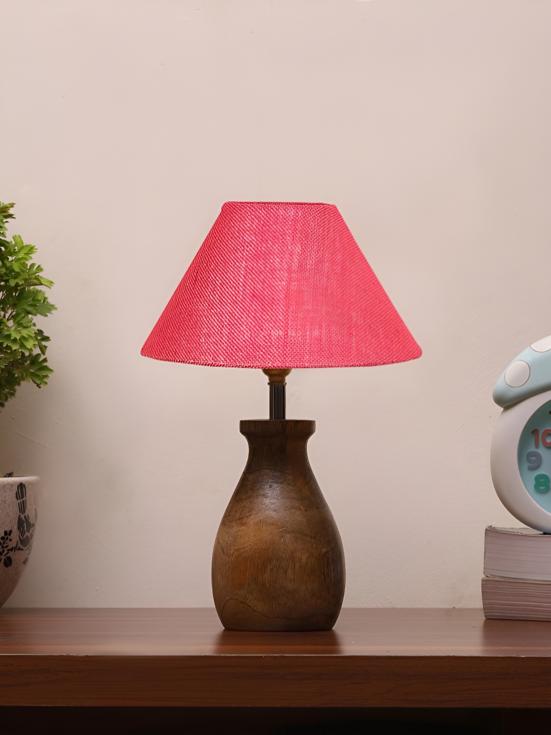 

Aura Pink Textured Frustum Shaped Jute Shade Table Lamp With Wooden Natural Base