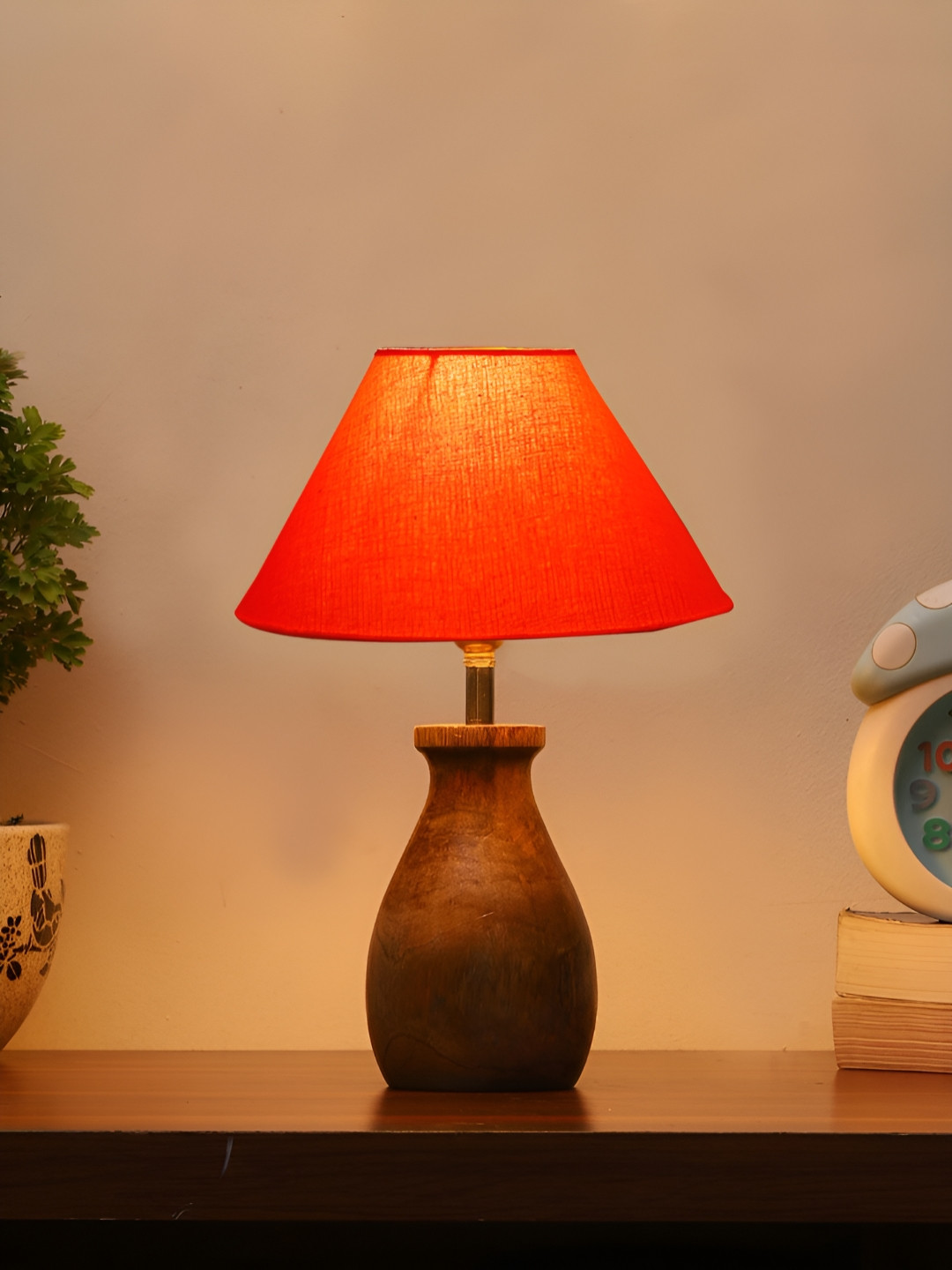

Aura Orange Wood Traditional Frusturical Shaped Table Lamp
