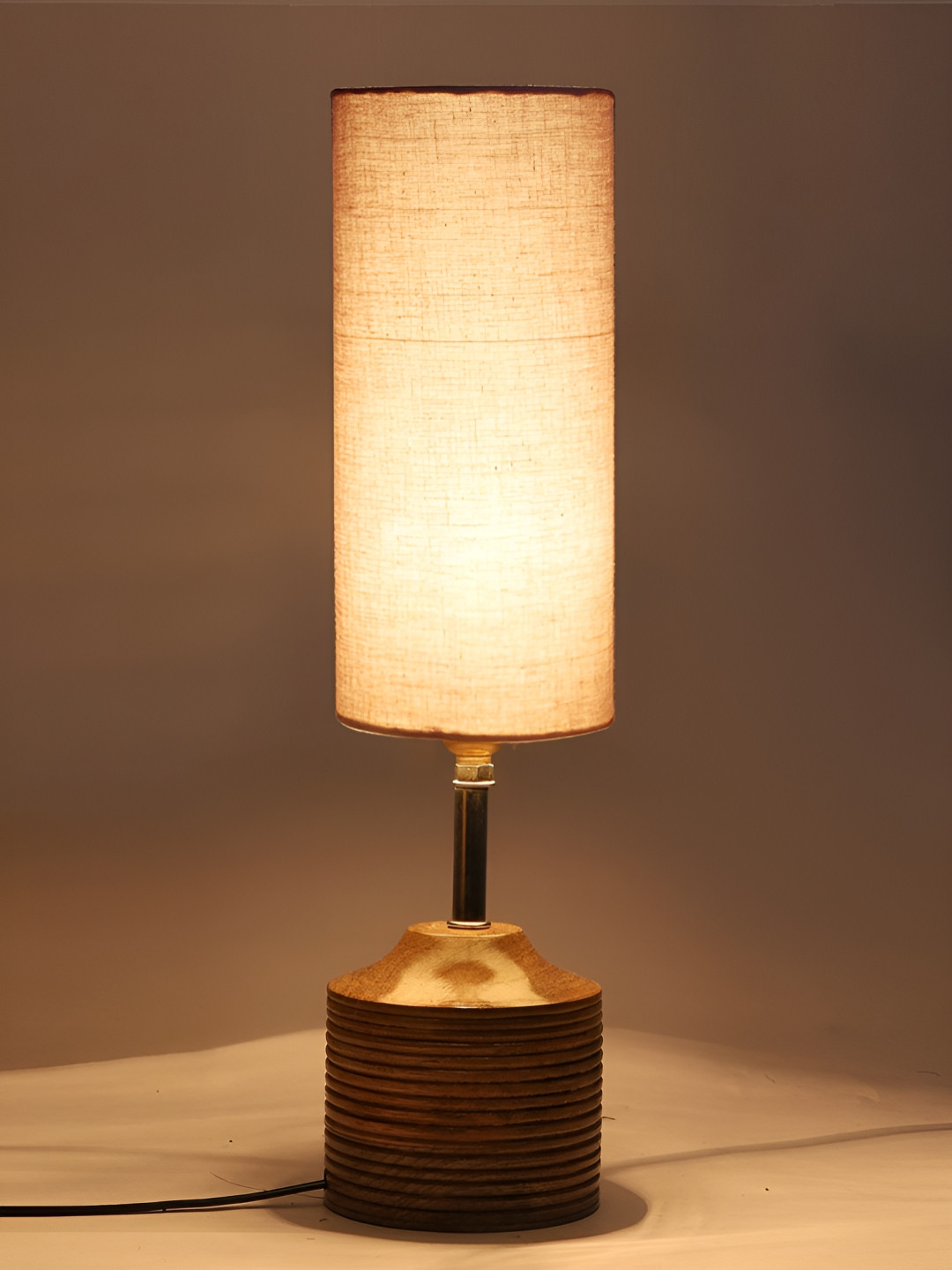 

Aura Grey Wooden & Cotton Shade Cylindrical Shaped Table Lamp