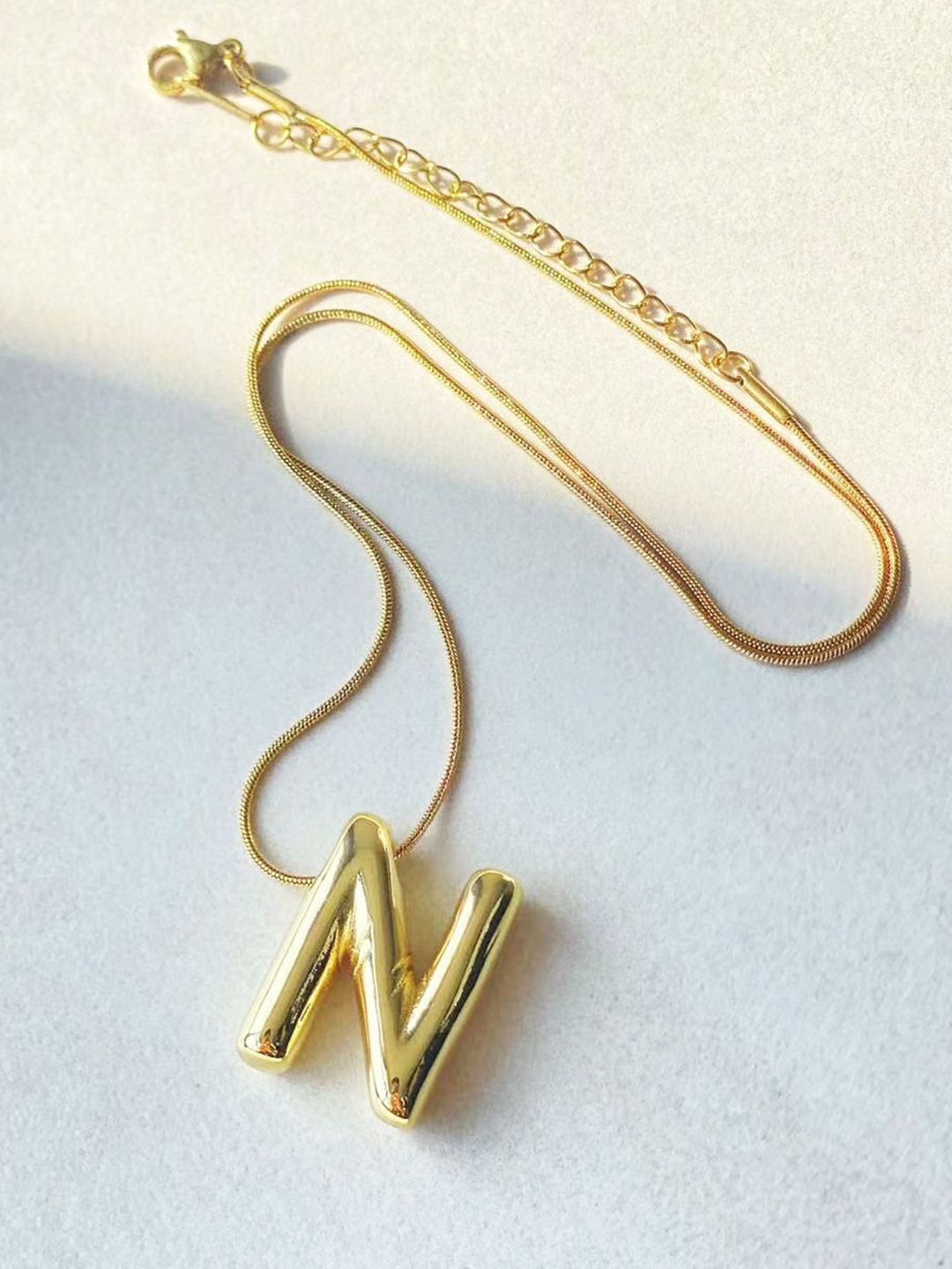 

MEENAZ Gold-Plated Stainless Steel Anti-Tarnish N Initial Alphabet Pendant With Chain