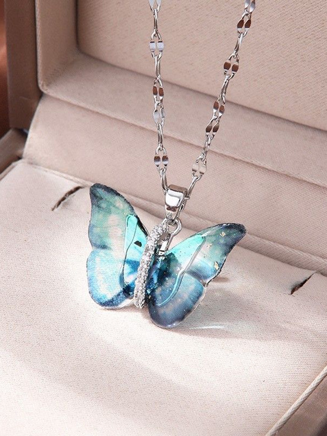 

MEENAZ Silver-Plated Stone Studded Stainless Steel Anti-Tarnish Butterfly Pendant & Chain