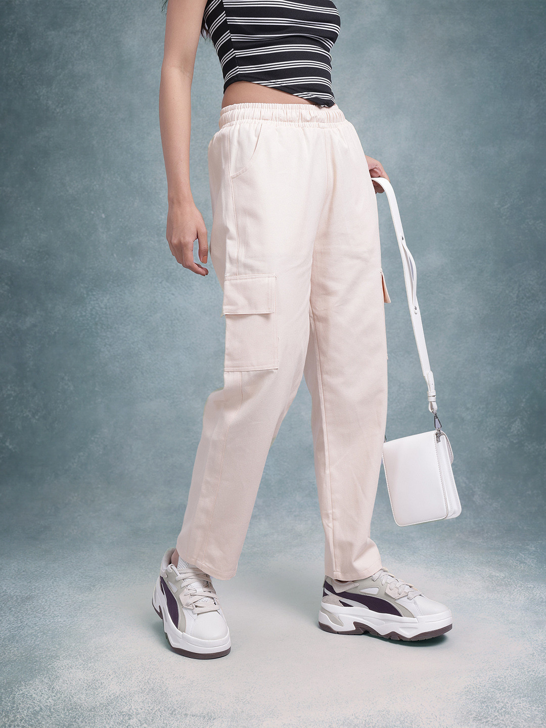 

The Roadster Lifestyle Co. Loose Fit High-Rise Easy Wash Cargos Trousers, Cream