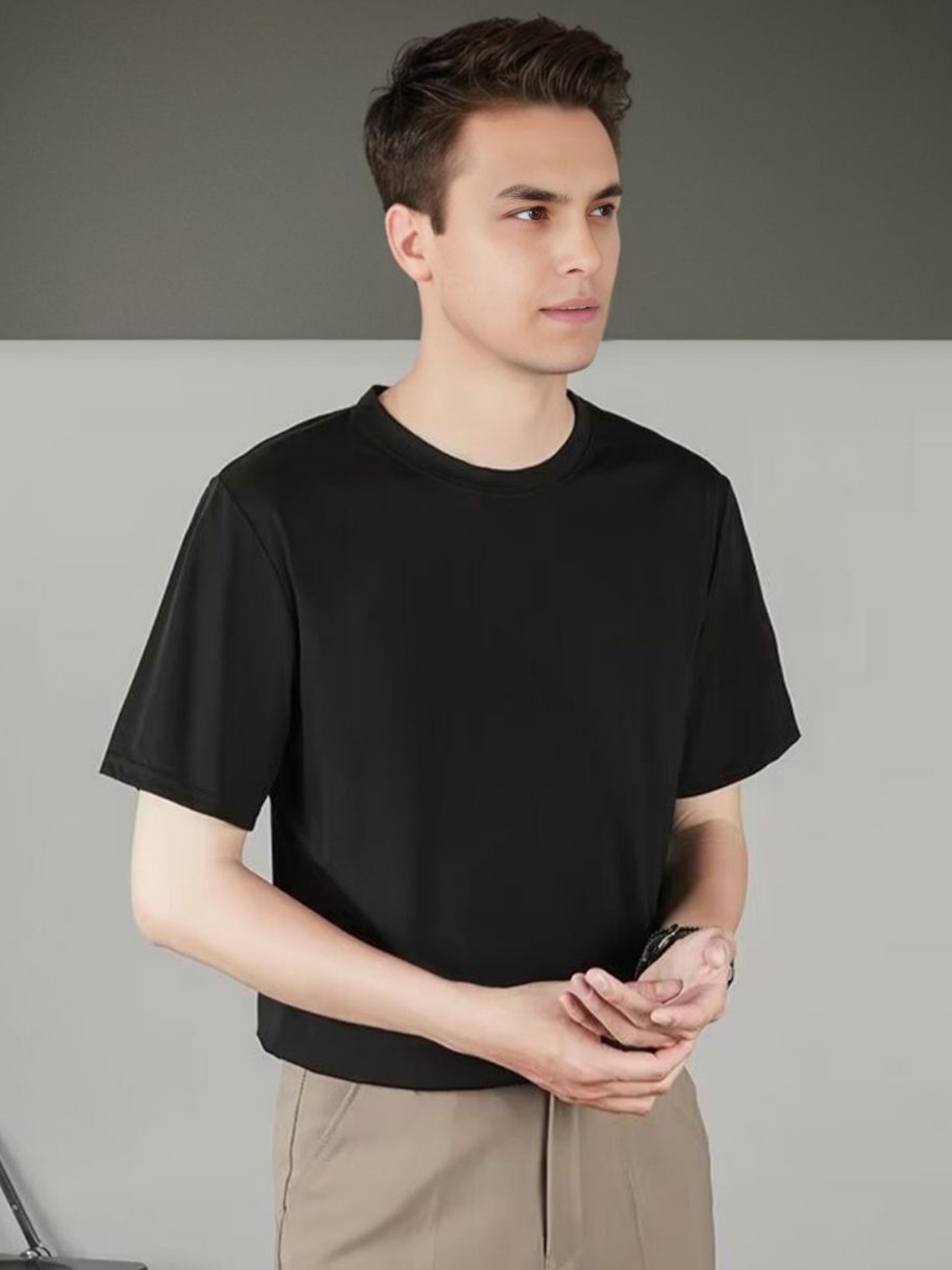

StyleCast Men Solid Round Neck Cotton T-shirt, Black