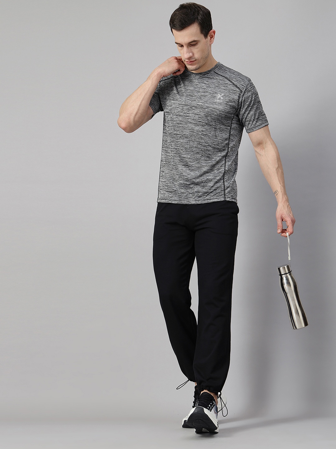 

HRX by Hrithik Roshan Men Solid Round Neck T-shirt, Grey