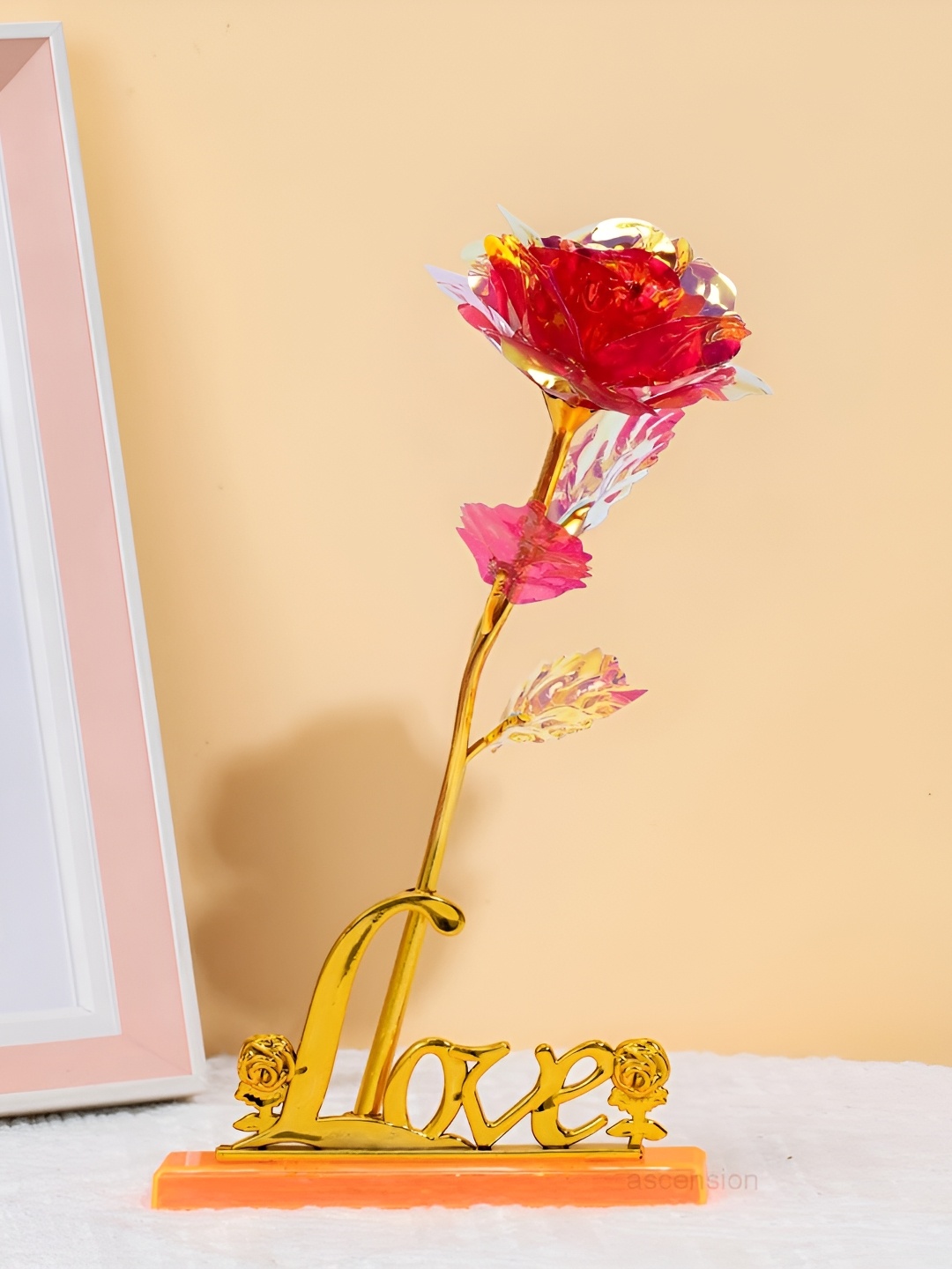 

Ascension Gold-Toned & Pink Textured Rose Flower With Love Stand Showpieces