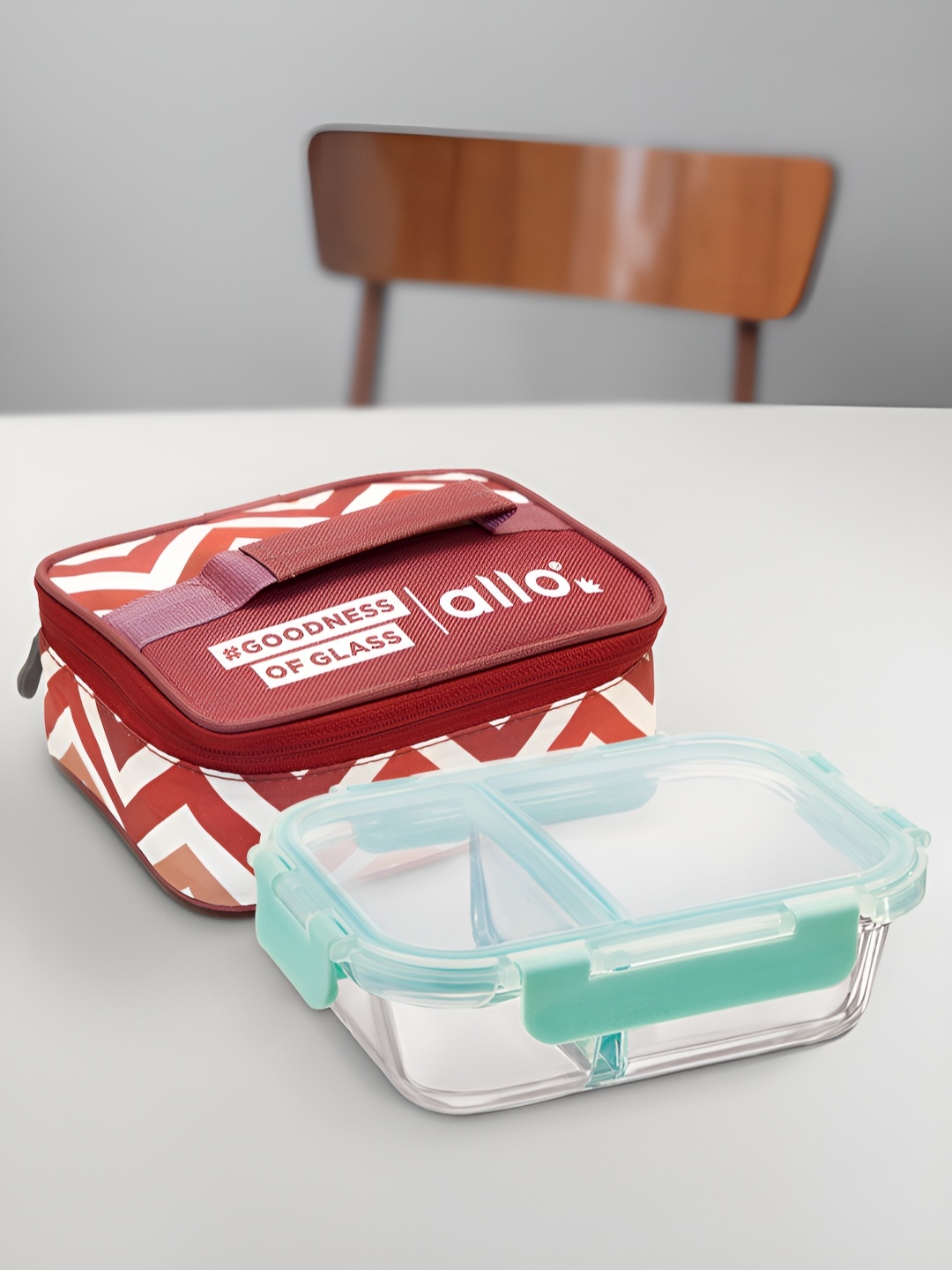 

Allo Transparent & Sea Green Glass Microwave Safe Lunch Box With Chevron Printed Bag