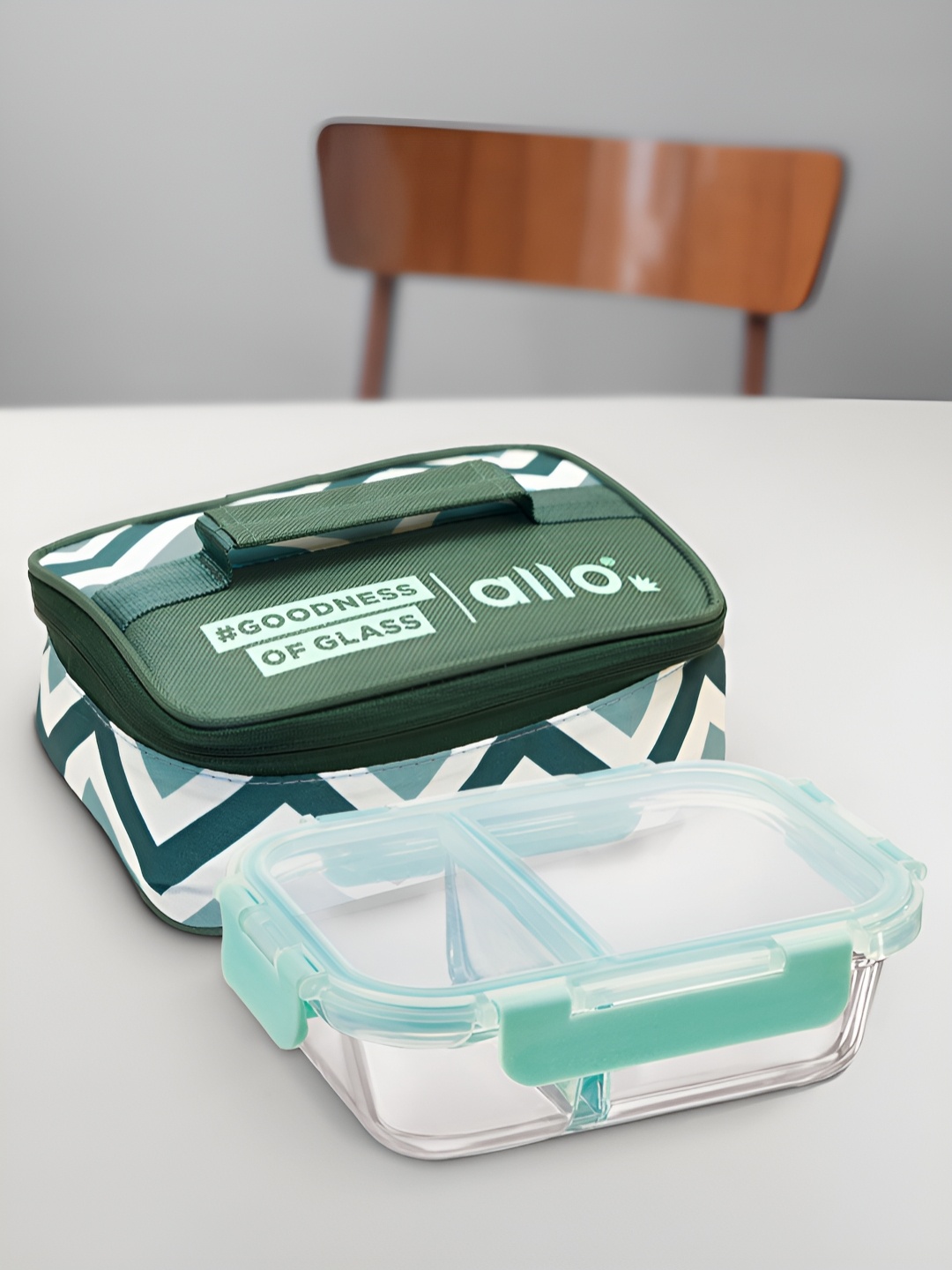 

Allo Transparent & Sea Green Glass Microwave Safe Lunch Box With Chevron Printed Bag