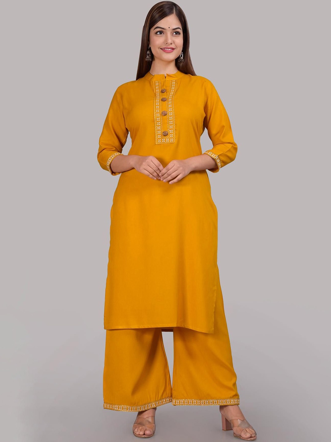 

Niona Mandarin Collar Thread Work Straight Kurta With Palazzo, Yellow