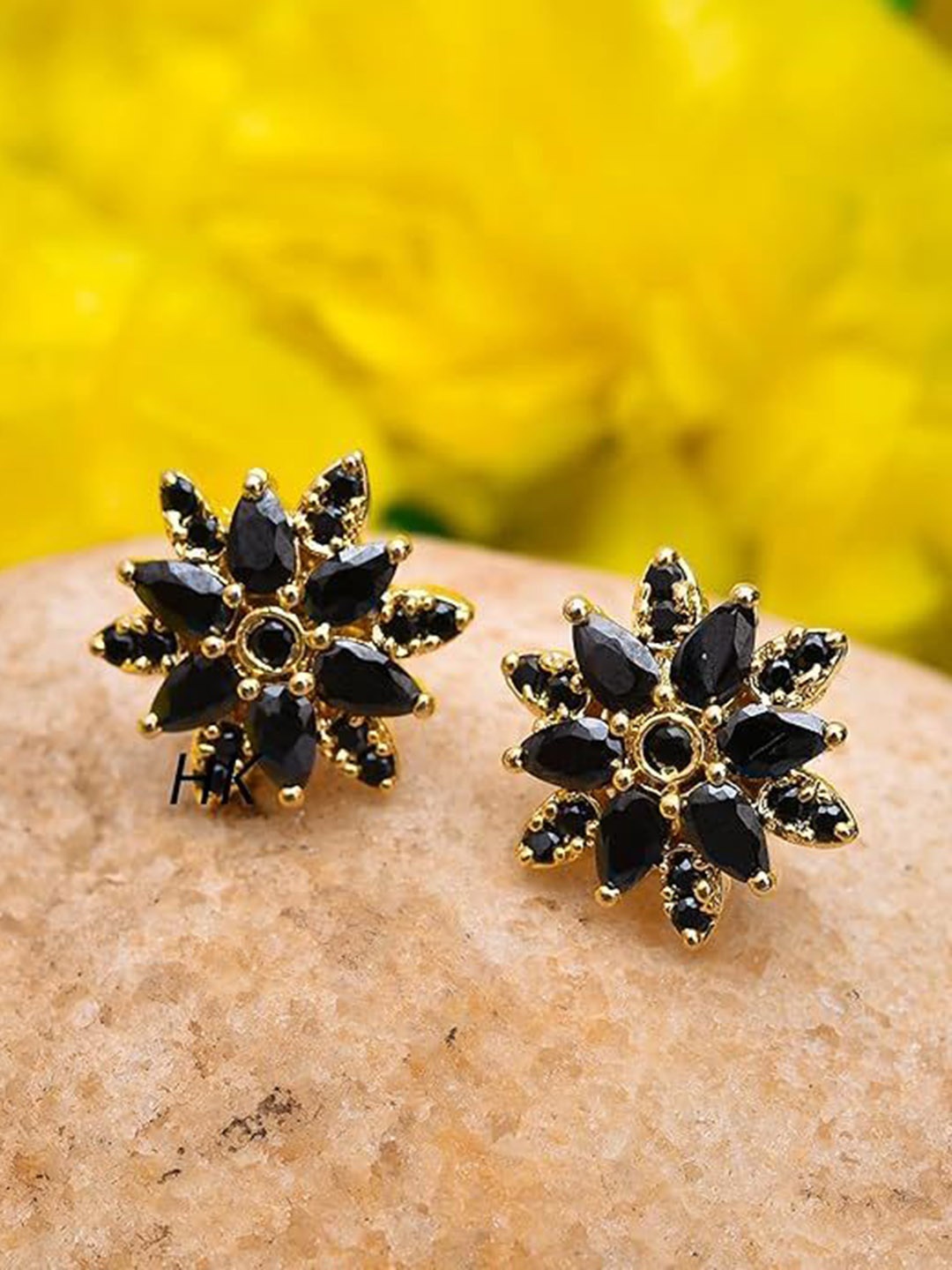 

Kezlin Gold-Plated Artificial Stone Studded Floral Shaped Studs, Black