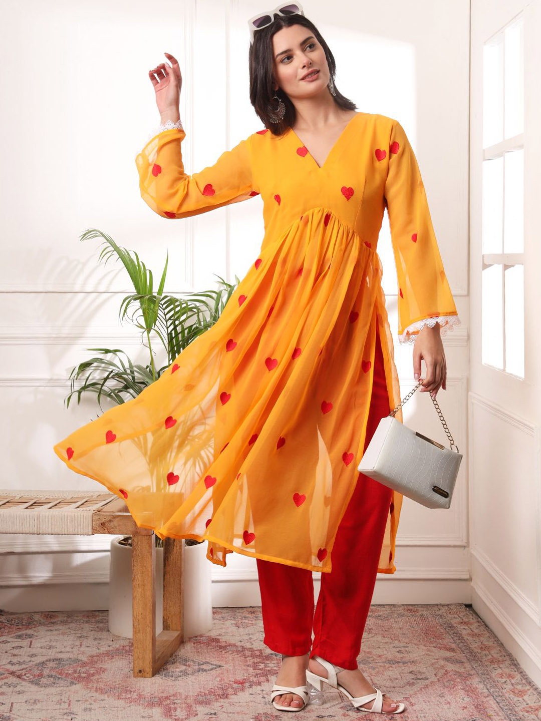 

Mitera Women Ethnic Motifs Embroidered Pleated Kurta with Pyjamas, Yellow