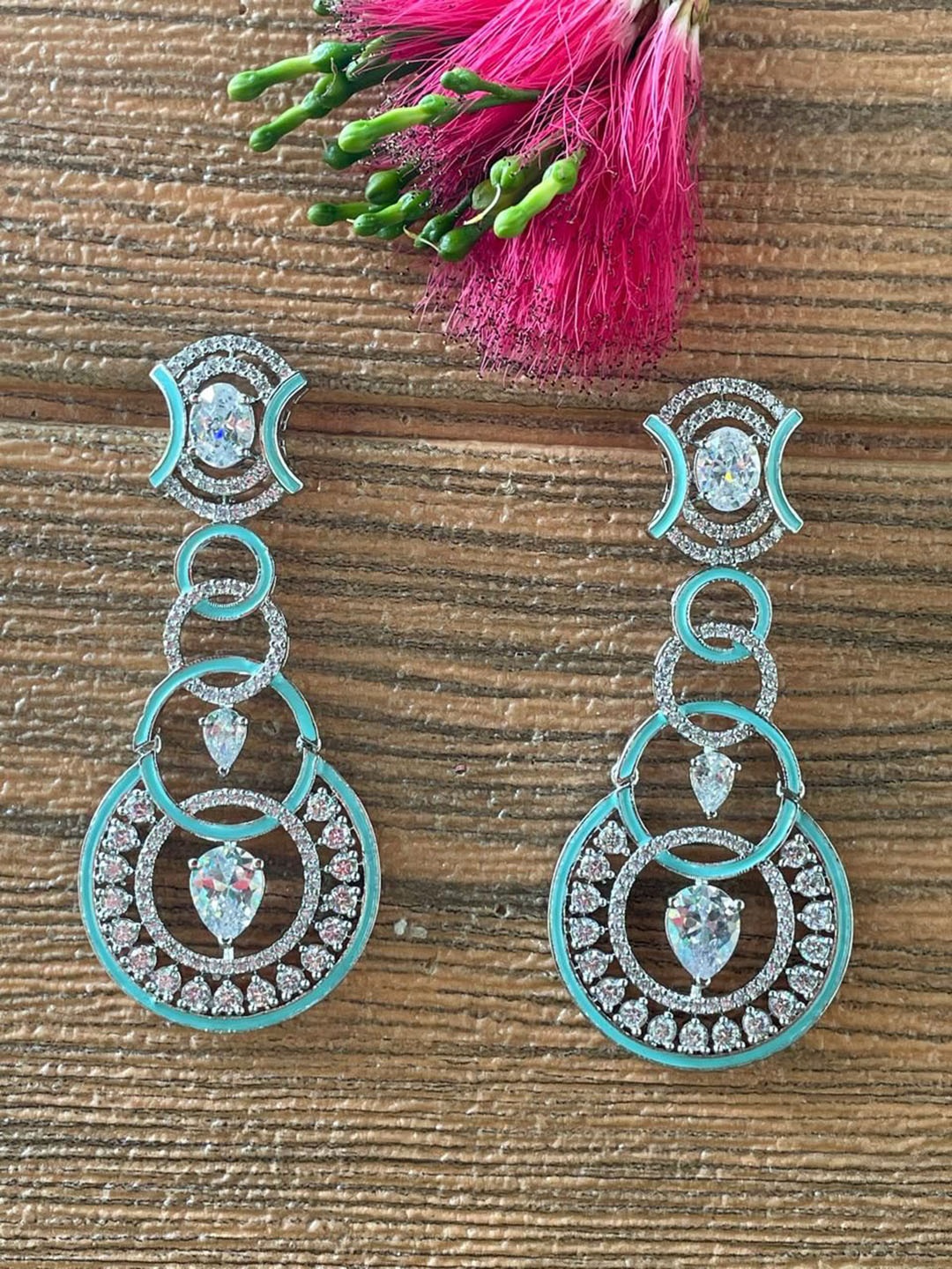 

MONI LIFESTYLE Silver Plated Artificial Stones Studded Contemporary Drop Earrings