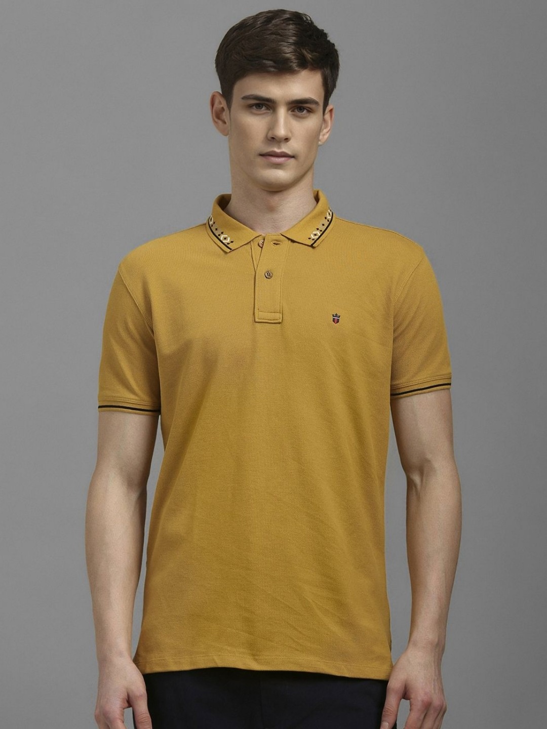 

Louis Philippe Jeans Men Solid Polo Collar Cotton T-shirt, Mustard