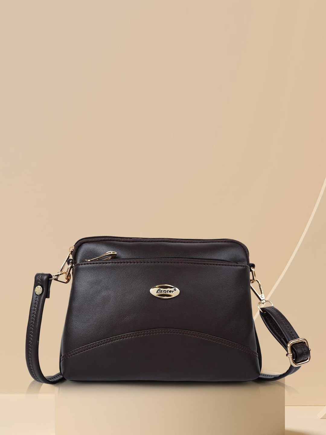 

Lancer Women Solid Structured Leather Sling Bag, Brown