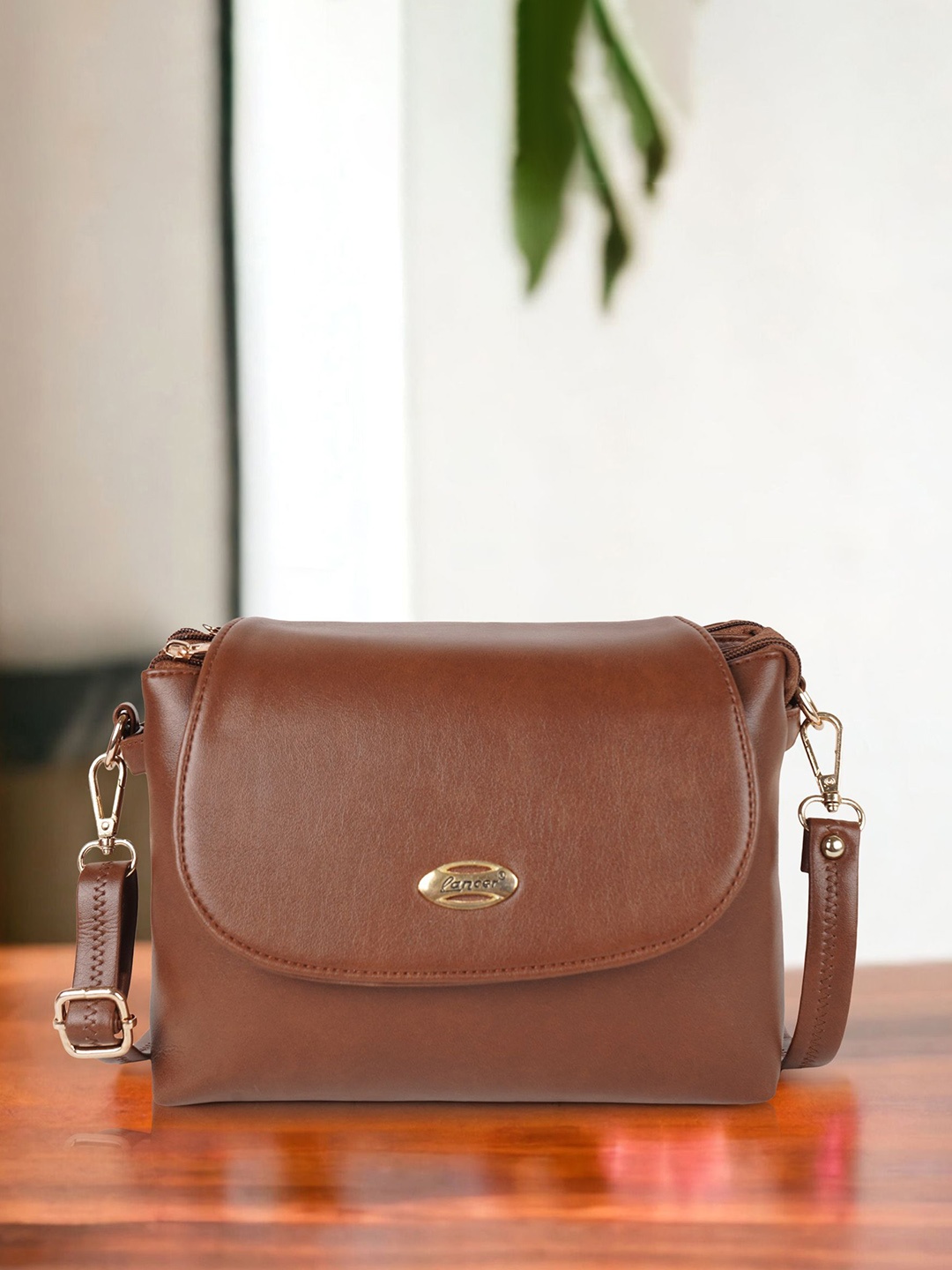 

Lancer Women Solid Structured Leather Sling Bag, Brown