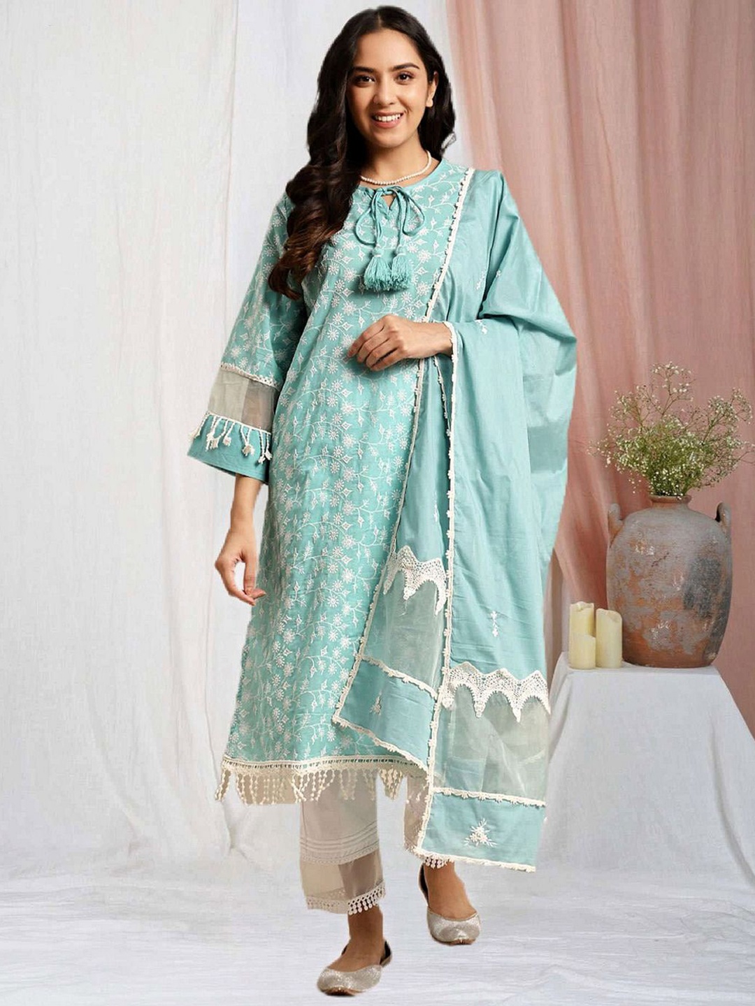 

Zuri Floral Embroidered Tie-up Neck Pure Cotton Straight Kurta With Trousers & Dupatta, Blue