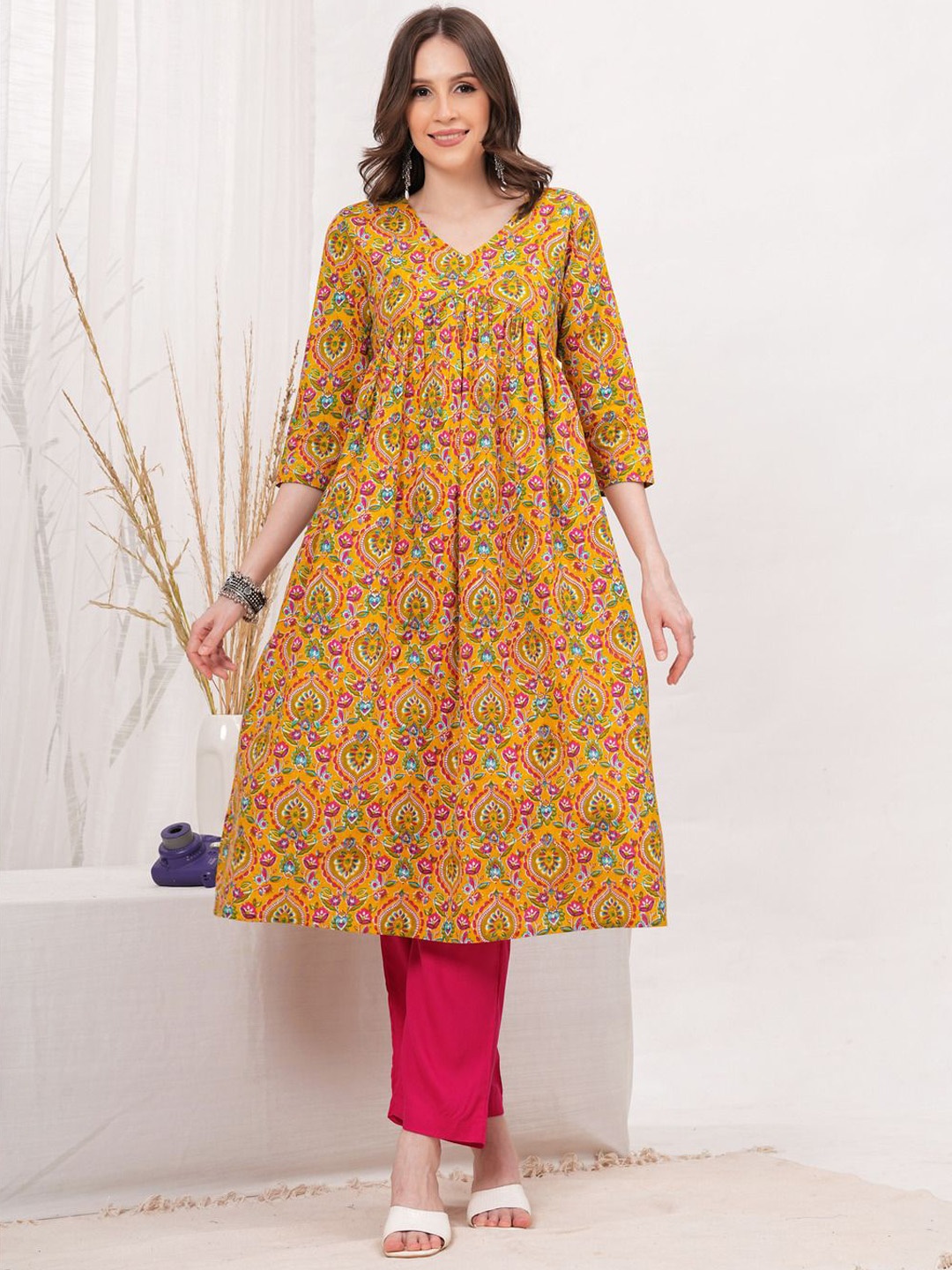 

Vilgi Floral Printed V-Neck Empire Pure Cotton A-Line Kurta, Mustard