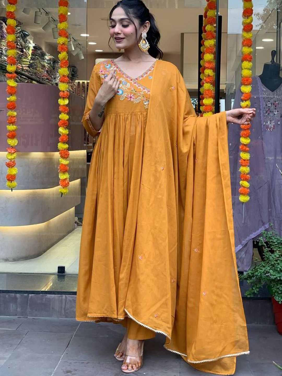 

Lilots V-Neck Angrakha Thread Work Anarkali Kurta With Trouser And Dupatta, Mustard