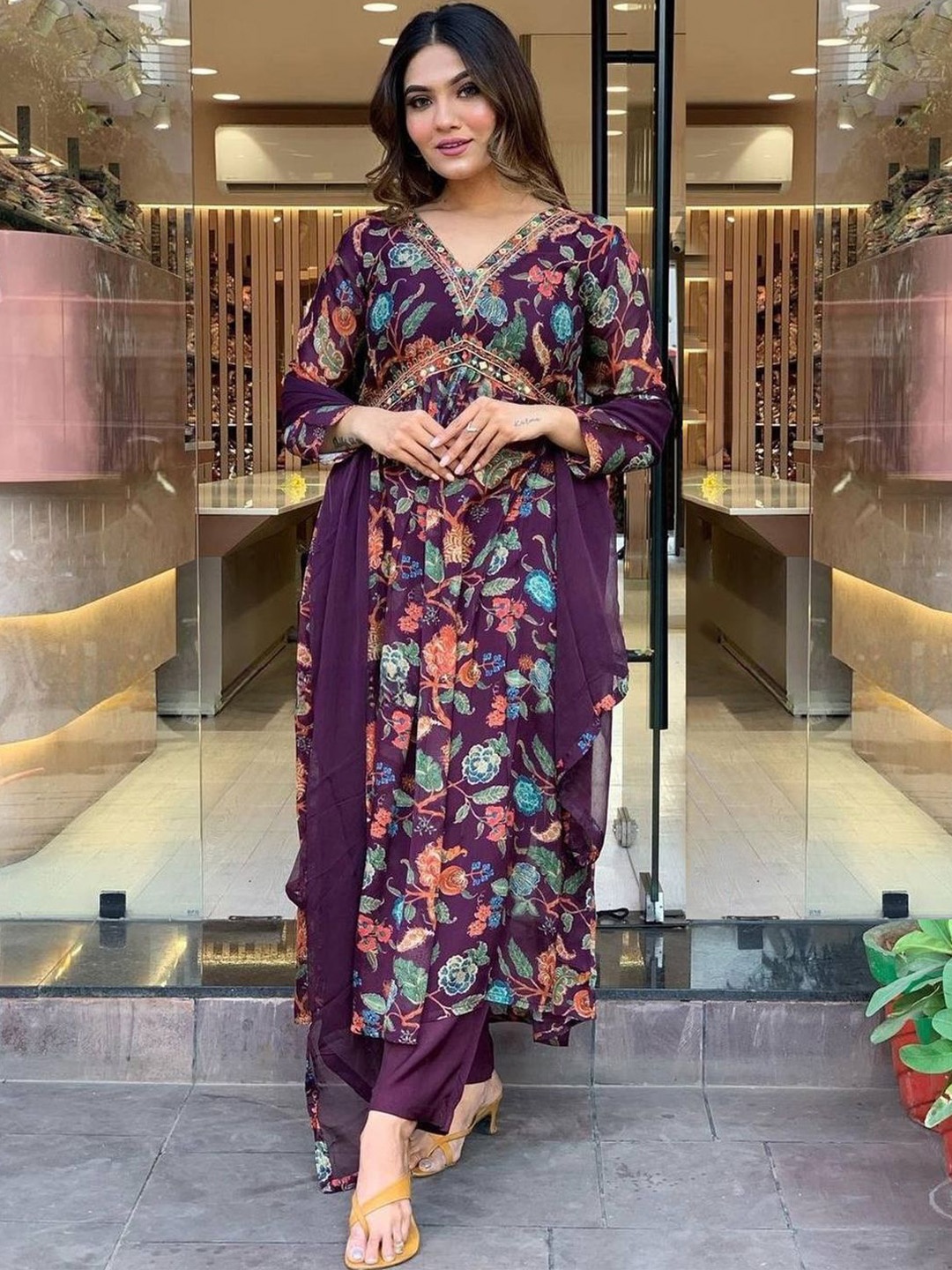 

Lilots Floral Printed V-Neck Thread Work Georgette A-Line Kurta With Trouser And Dupatta, Purple