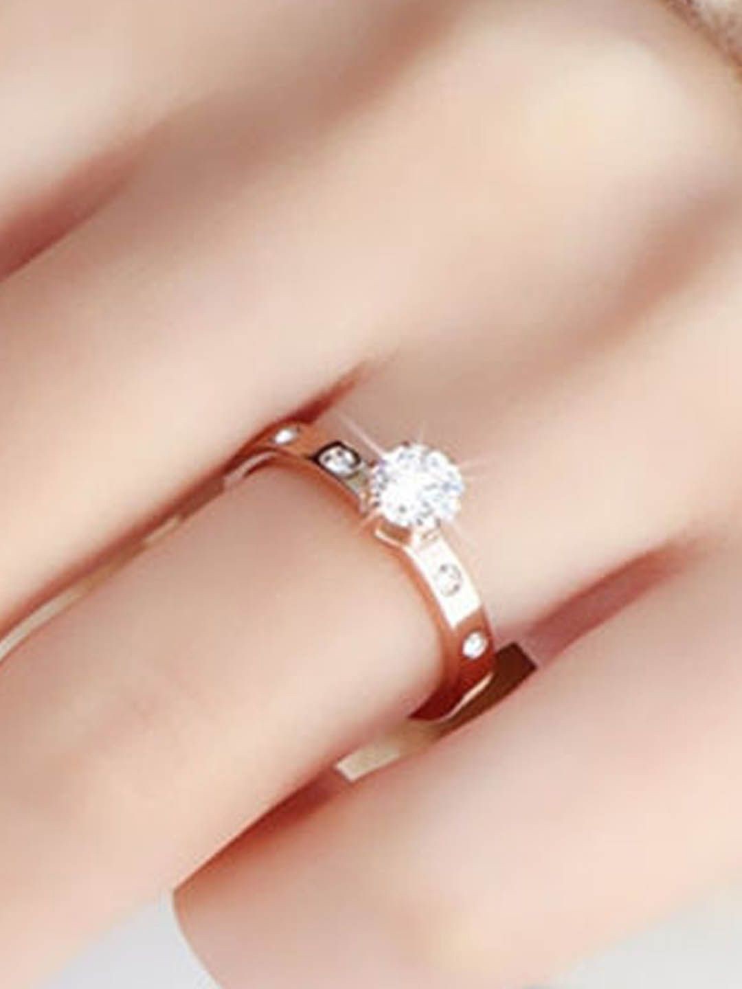 

StyleCast Gold-Toned Stone-Studded Elegant Finger Ring