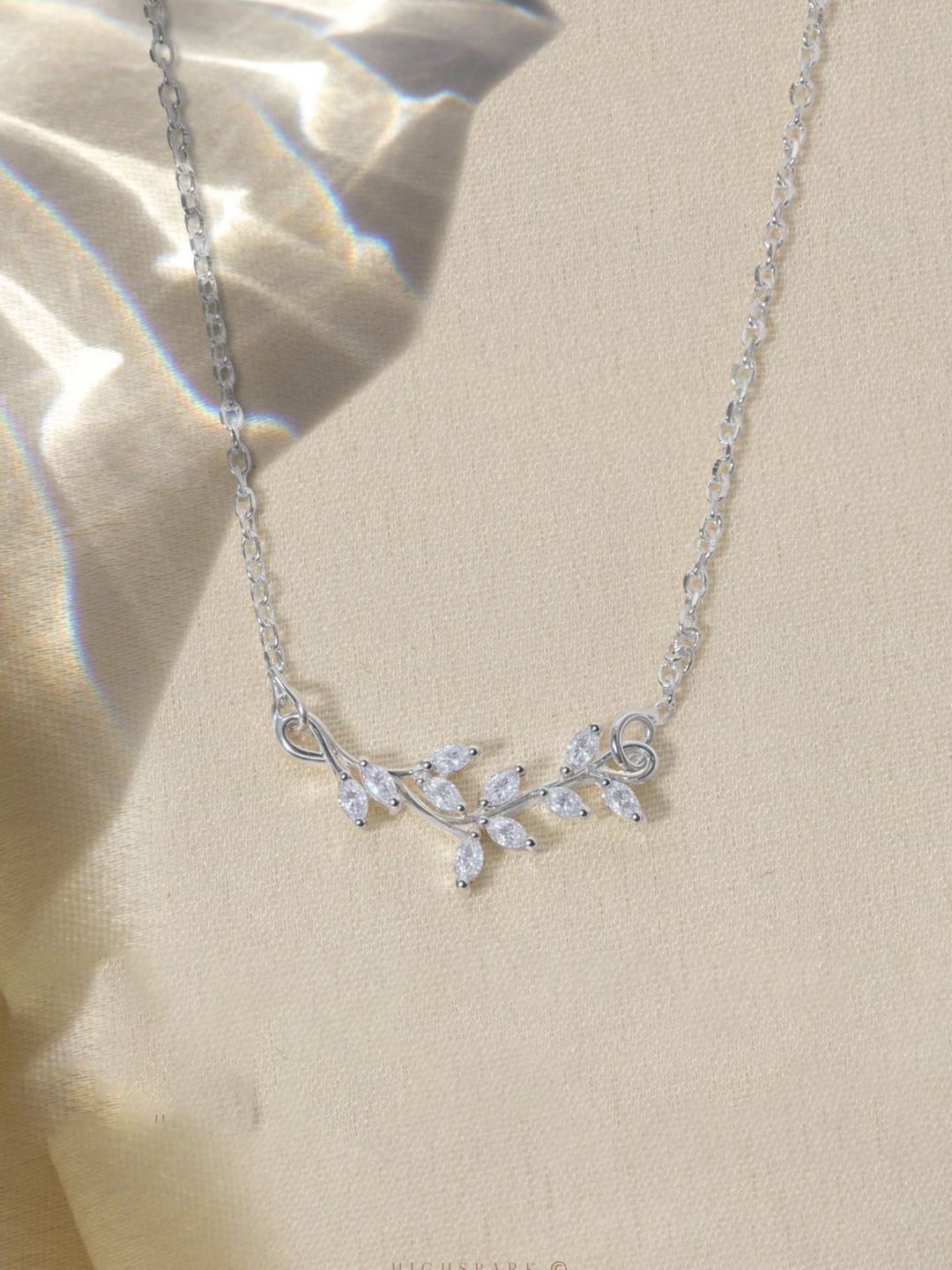 

HighSpark 92.5 Sterling Silver CZ Studded Solitaire Leaf Chain