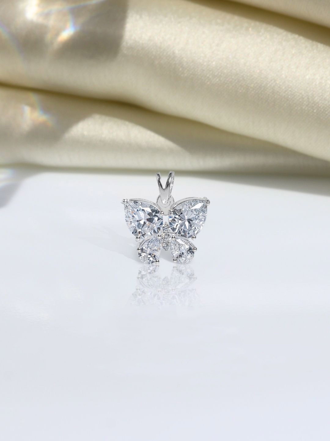 

HighSpark 92.5 Sterling Silver Cubic Zirconia Studded Butterfly Solitaire Pendant