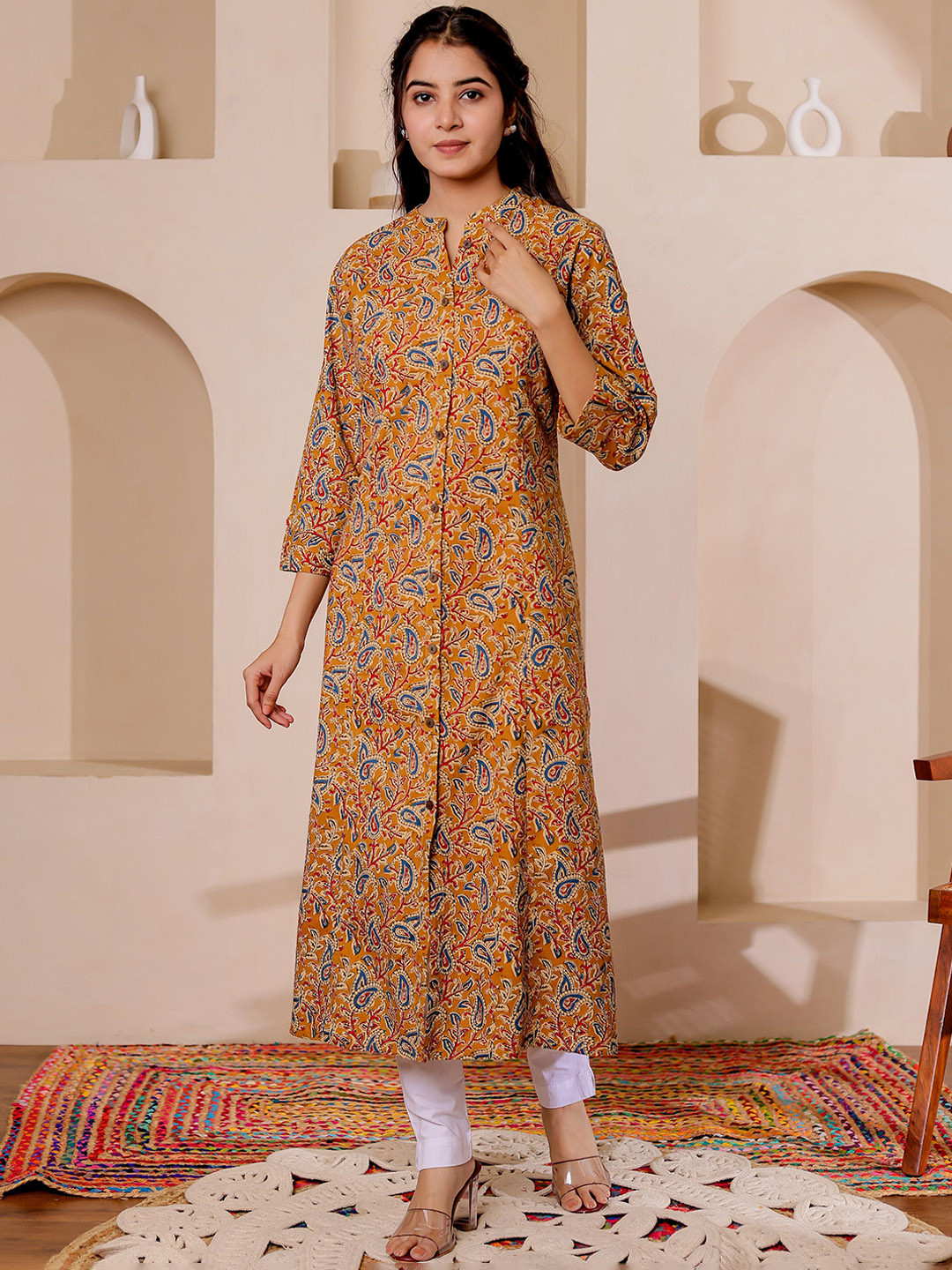 

VASVI Paisely Printed Mandarin Collar Kalamkari Cotton A-Line Kurta, Mustard