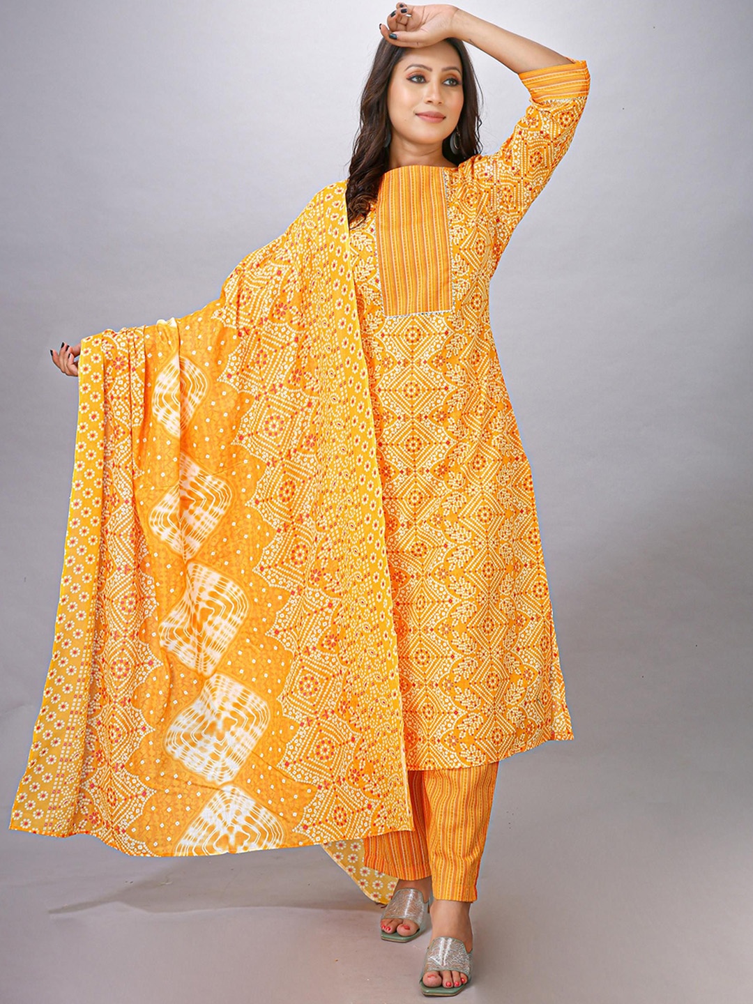 

Krimmple Bandhani Printed Round Neck Gotta Patti Straight Kurta With Trouser And Dupatta, Yellow