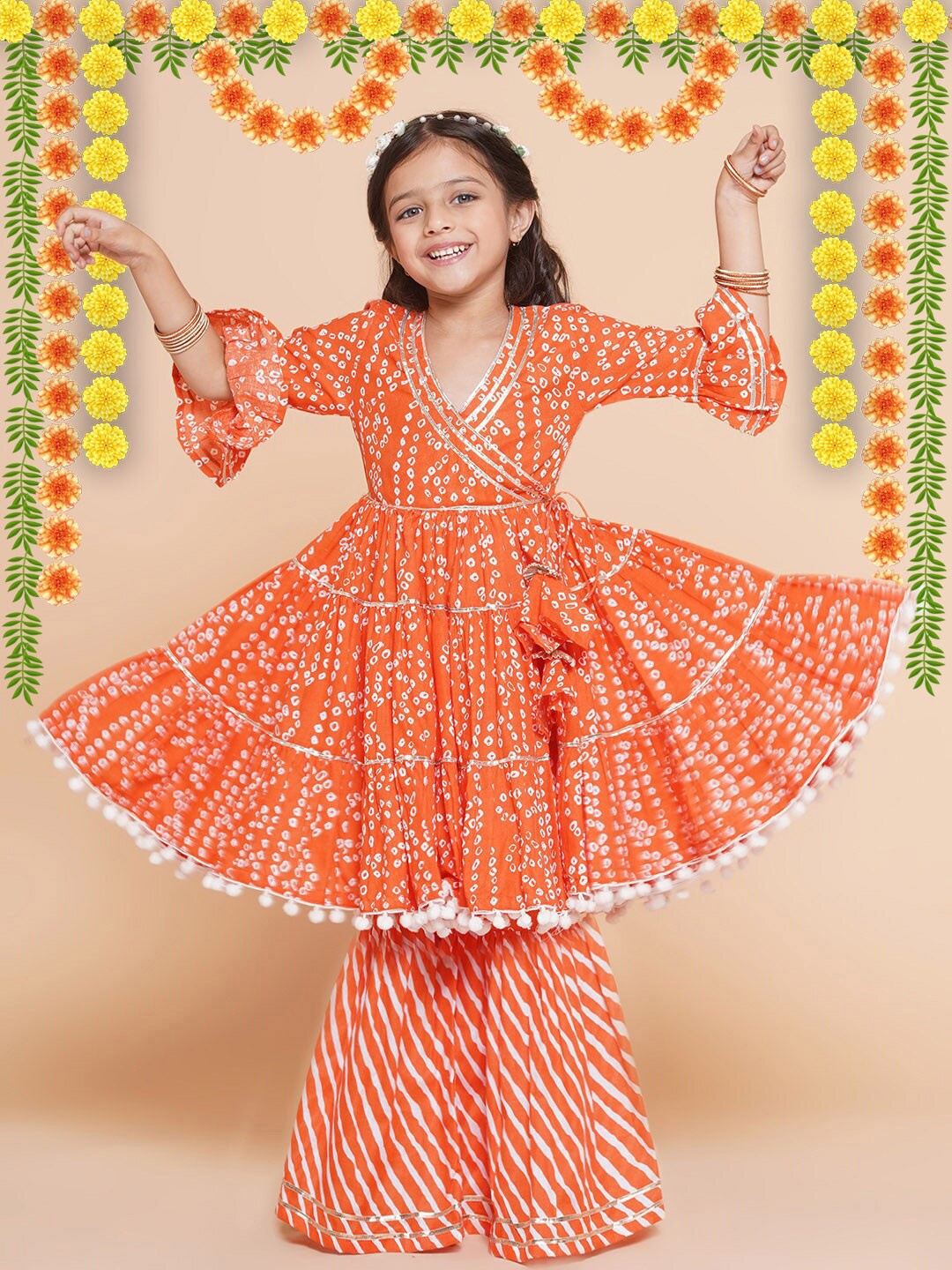 

Little Zing Girls Bandhani Printed Pure Cotton Gotta Patti Angrakha Kurta With Sharara, Orange