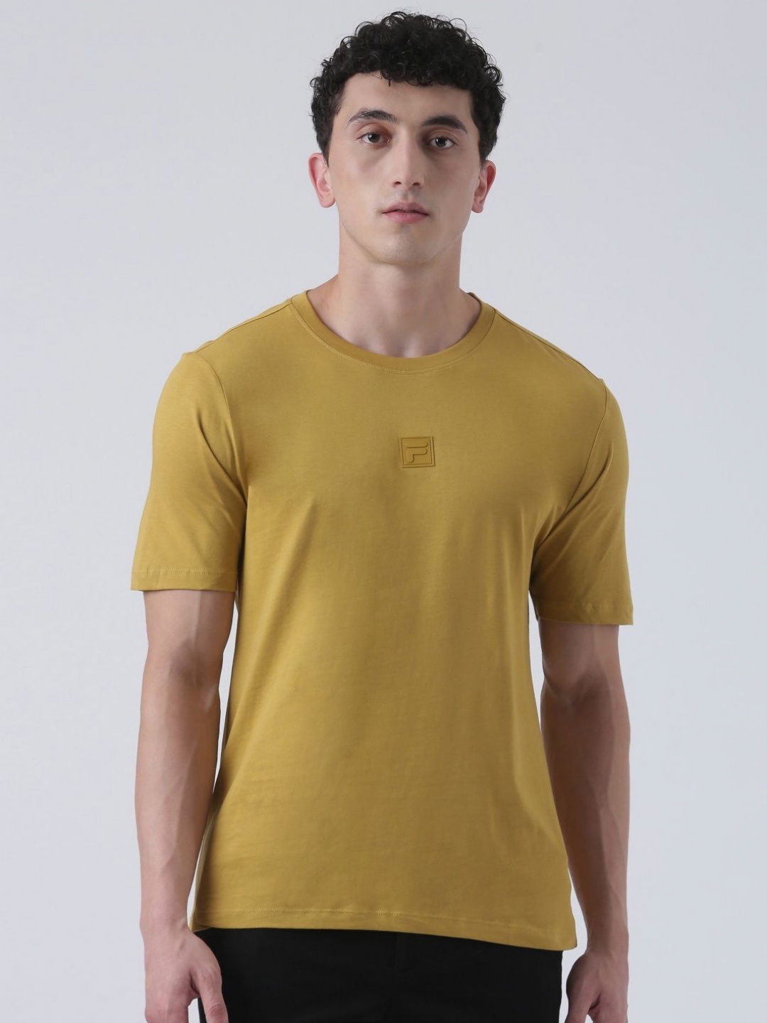 

FILA Men Solid Applique Slim Fit Pure Cotton T-shirt, Mustard