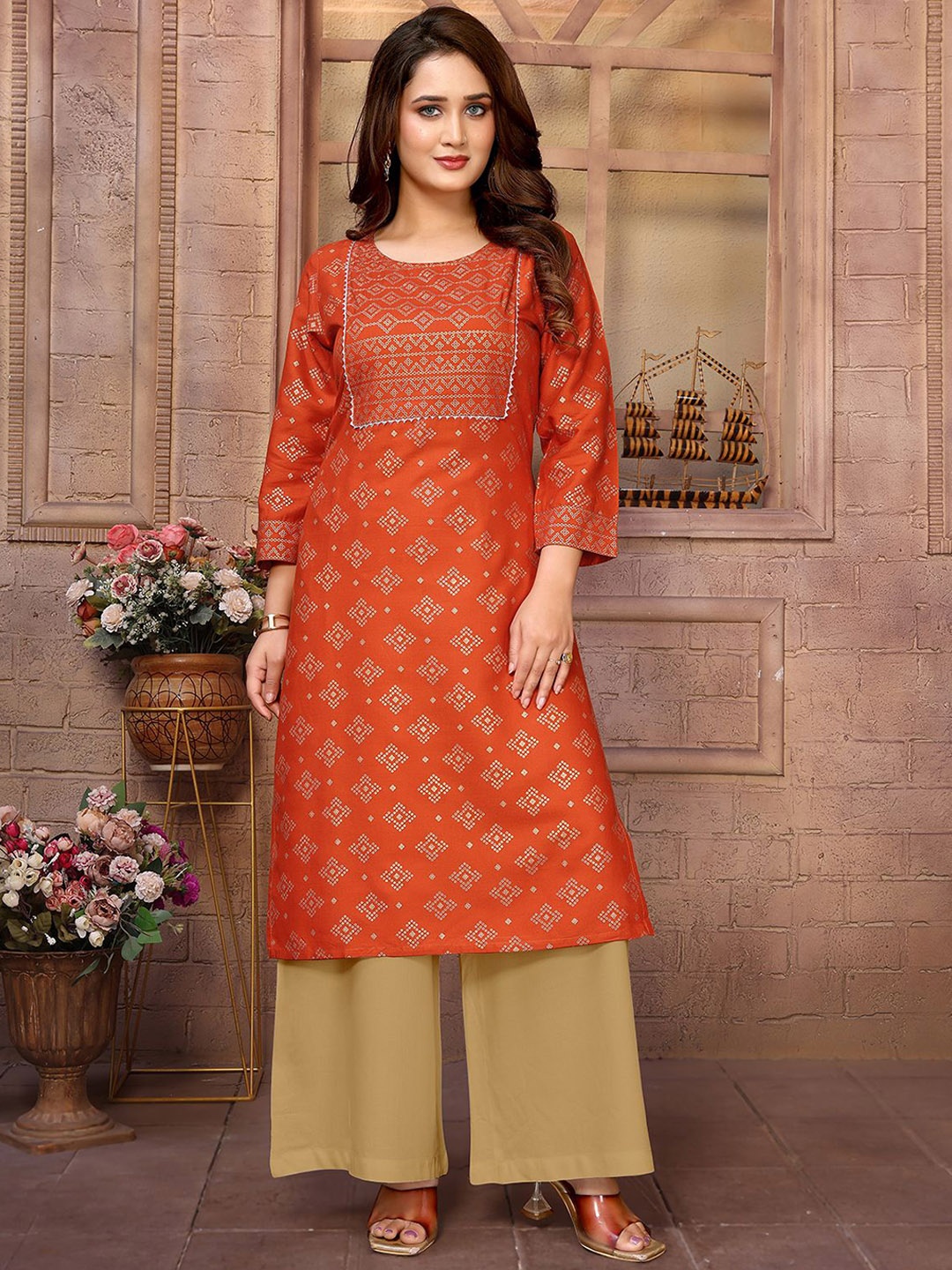 

Rangita Geometric Printed Gotta Patti Round Neck Straight Kurta, Orange